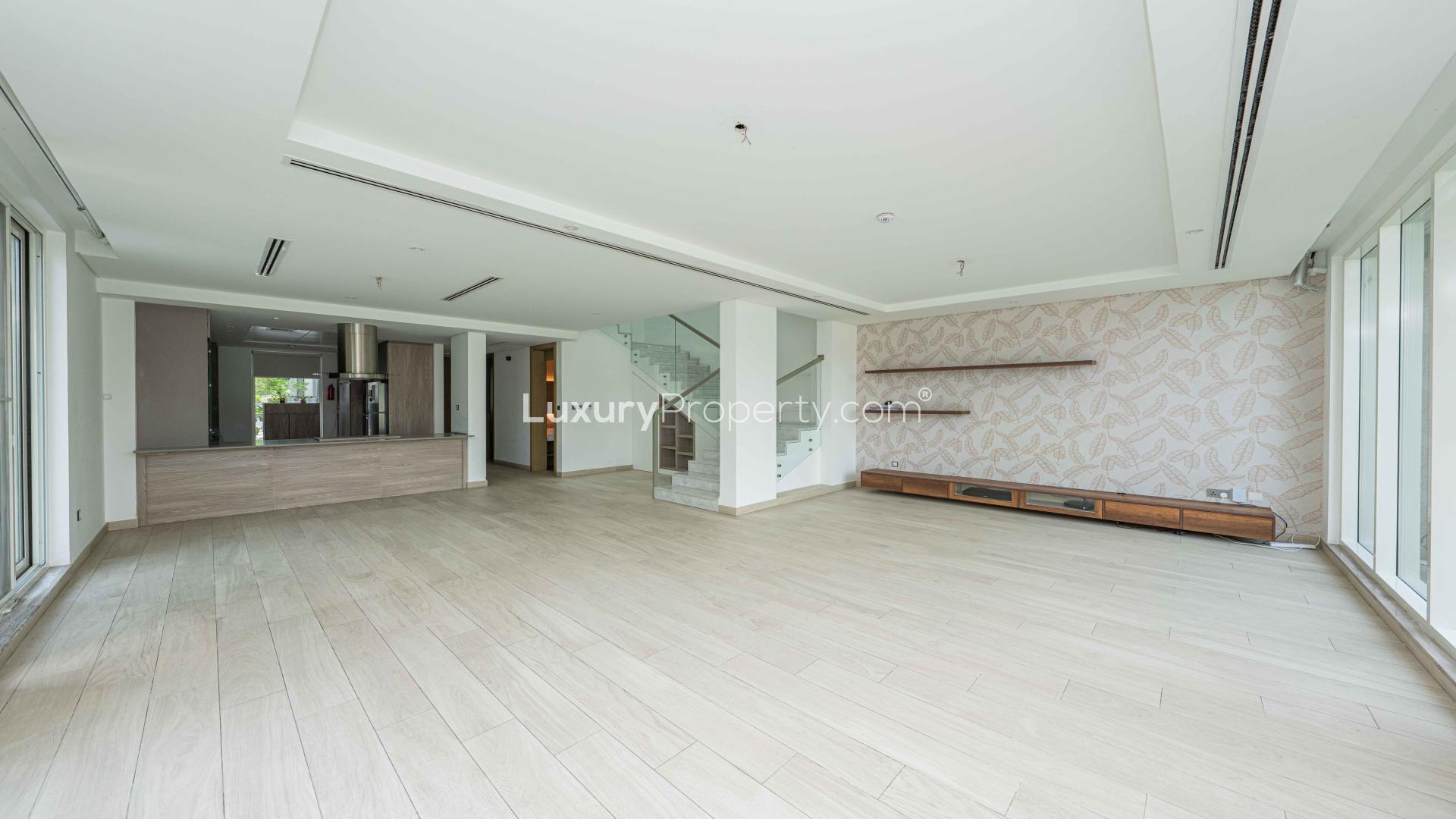 Modern 4-bedroom townhouse exterior with garden in Jumeirah Park's Royal Park community
