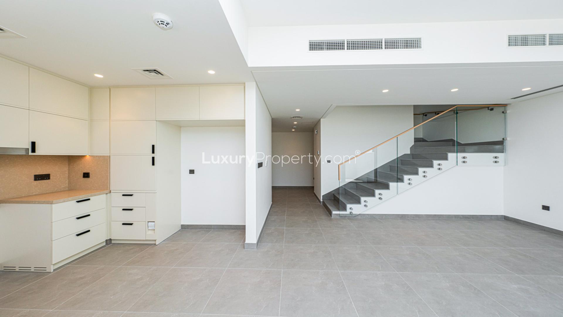 Modern kitchen and living area in 4-bed townhouse, Ruba, Arabian Ranches 3 for rent