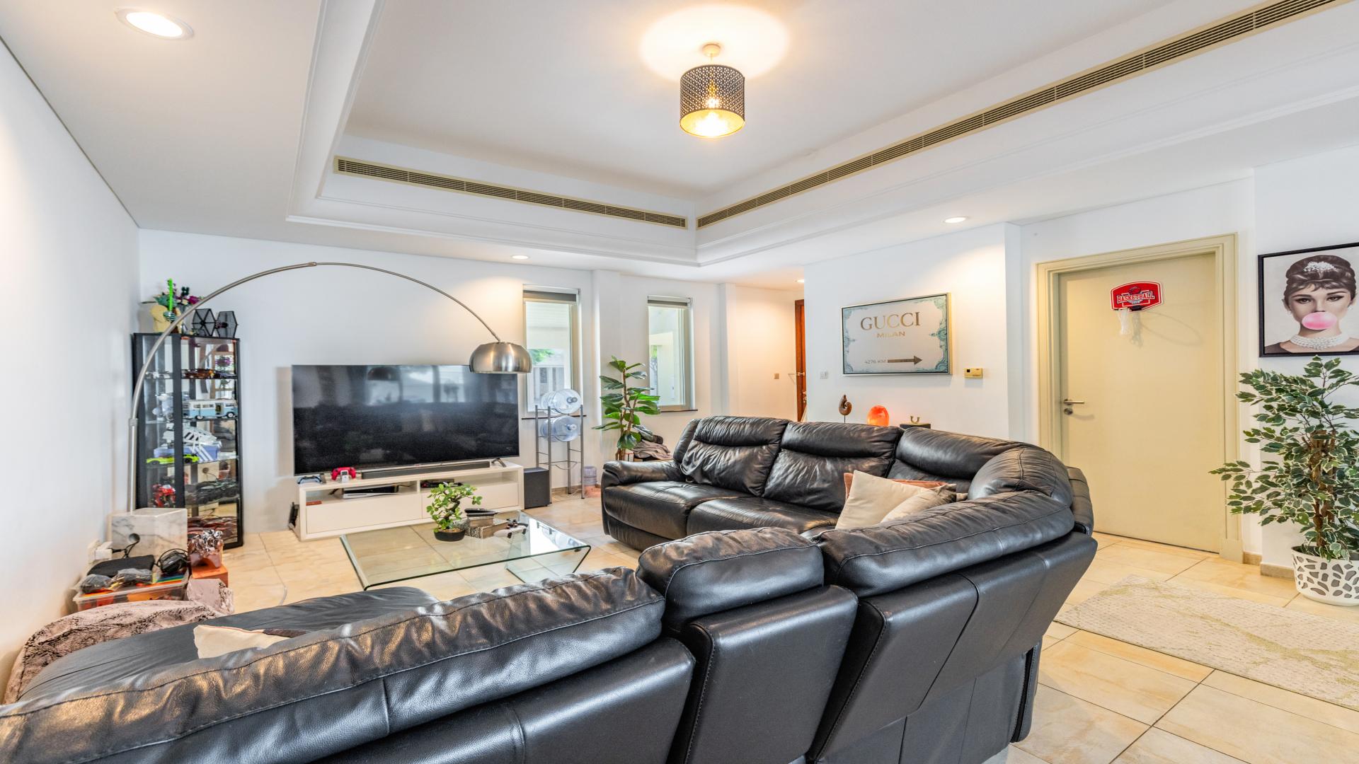 Luxury 4-bedroom townhouse exterior in Victory Heights, Dubai Sports City, available for rent