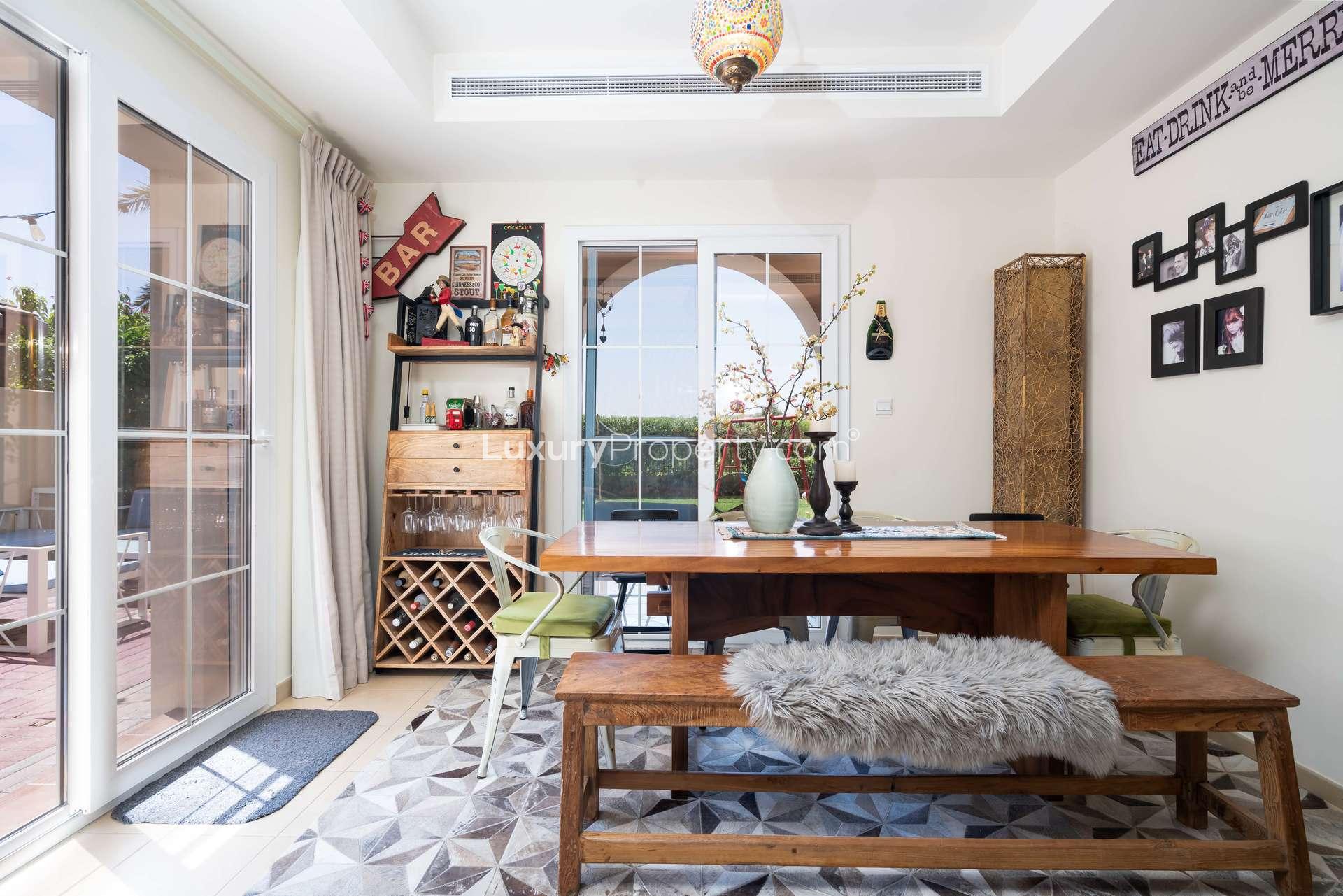 Bright bedroom in 4-bedroom townhouse, Alma, Arabian Ranches with balcony view