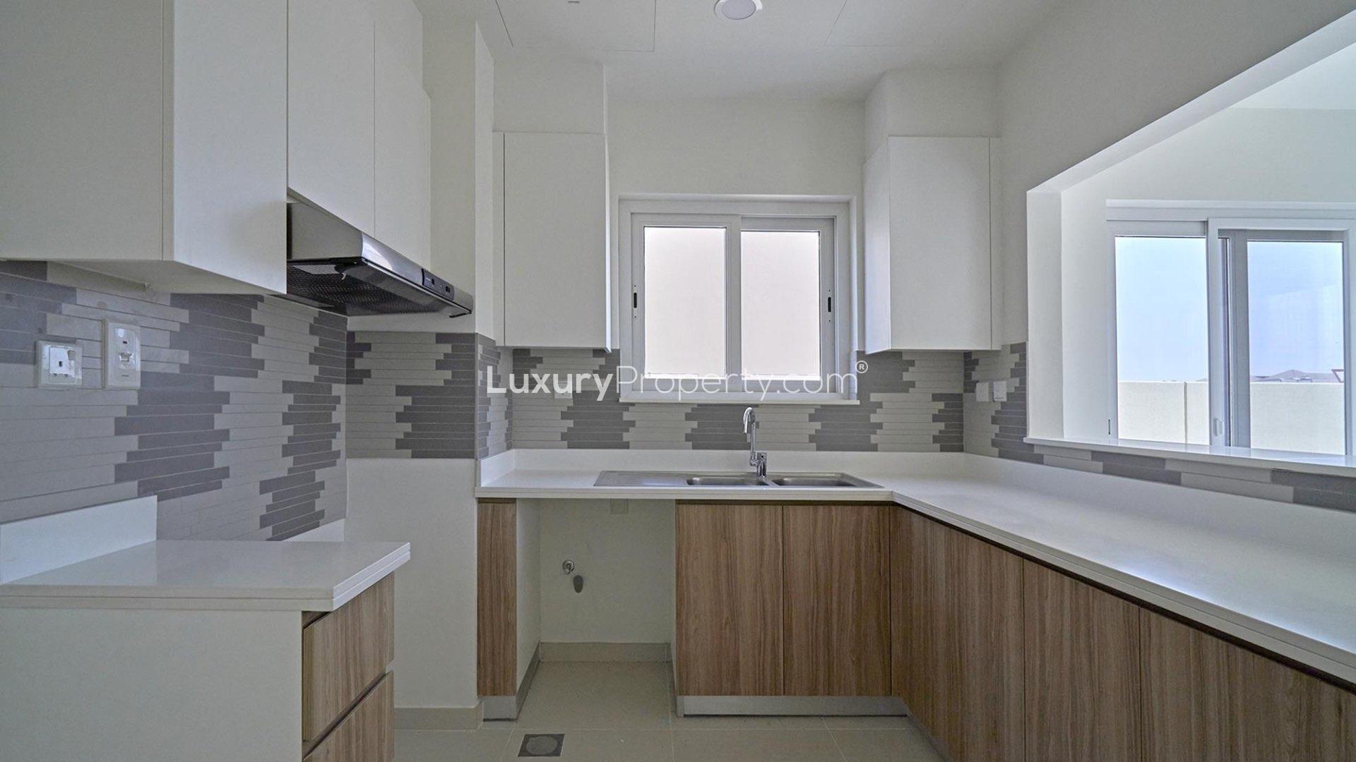 Brand new Amaranta townhouse interior with staircase and sliding doors in Villanova, Dubai Land