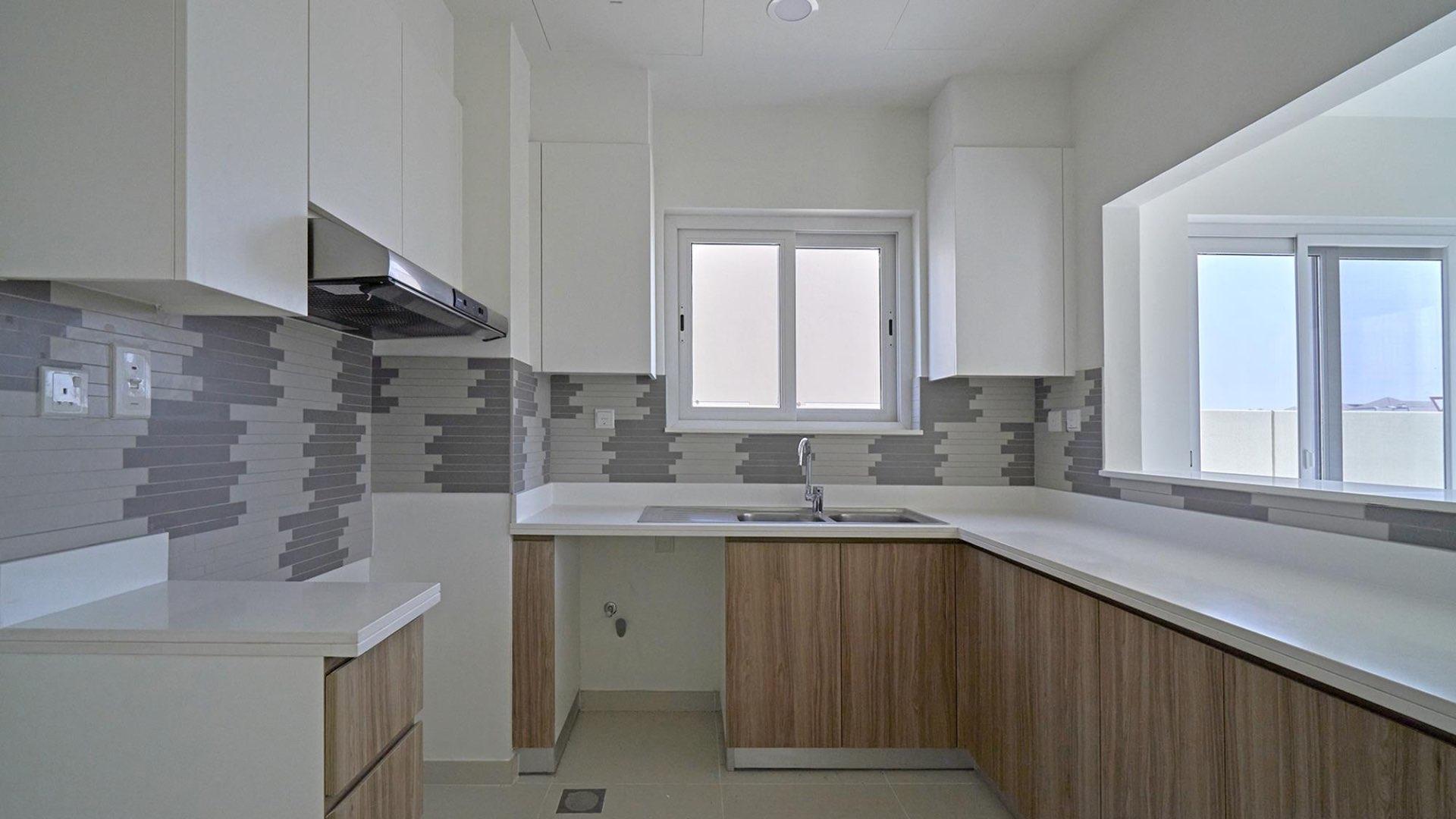 Brand new Amaranta townhouse interior with staircase and sliding doors in Villanova, Dubai Land