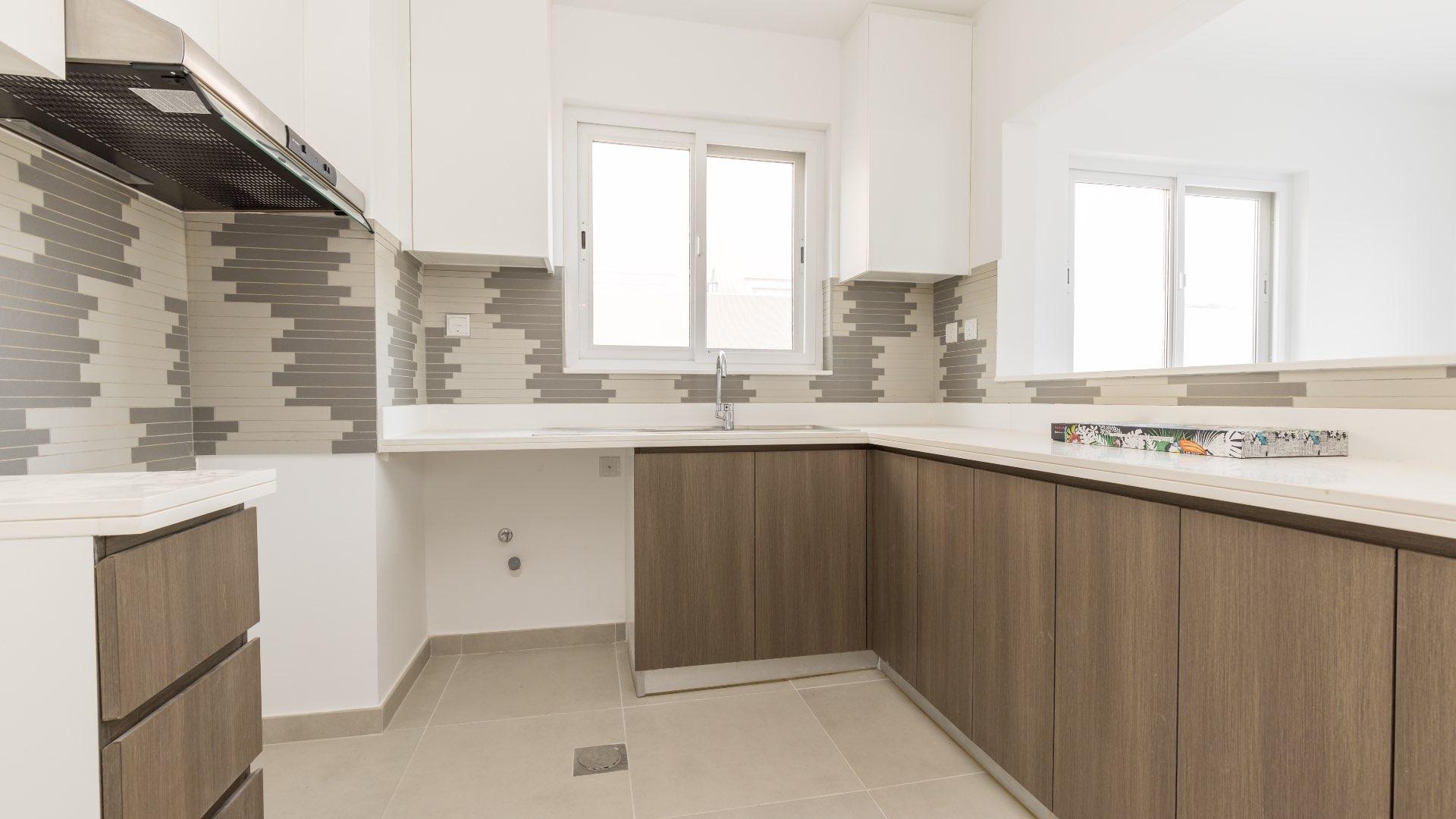 Lovely Villanova townhouse near community swimming pool in Dubai Land for rent