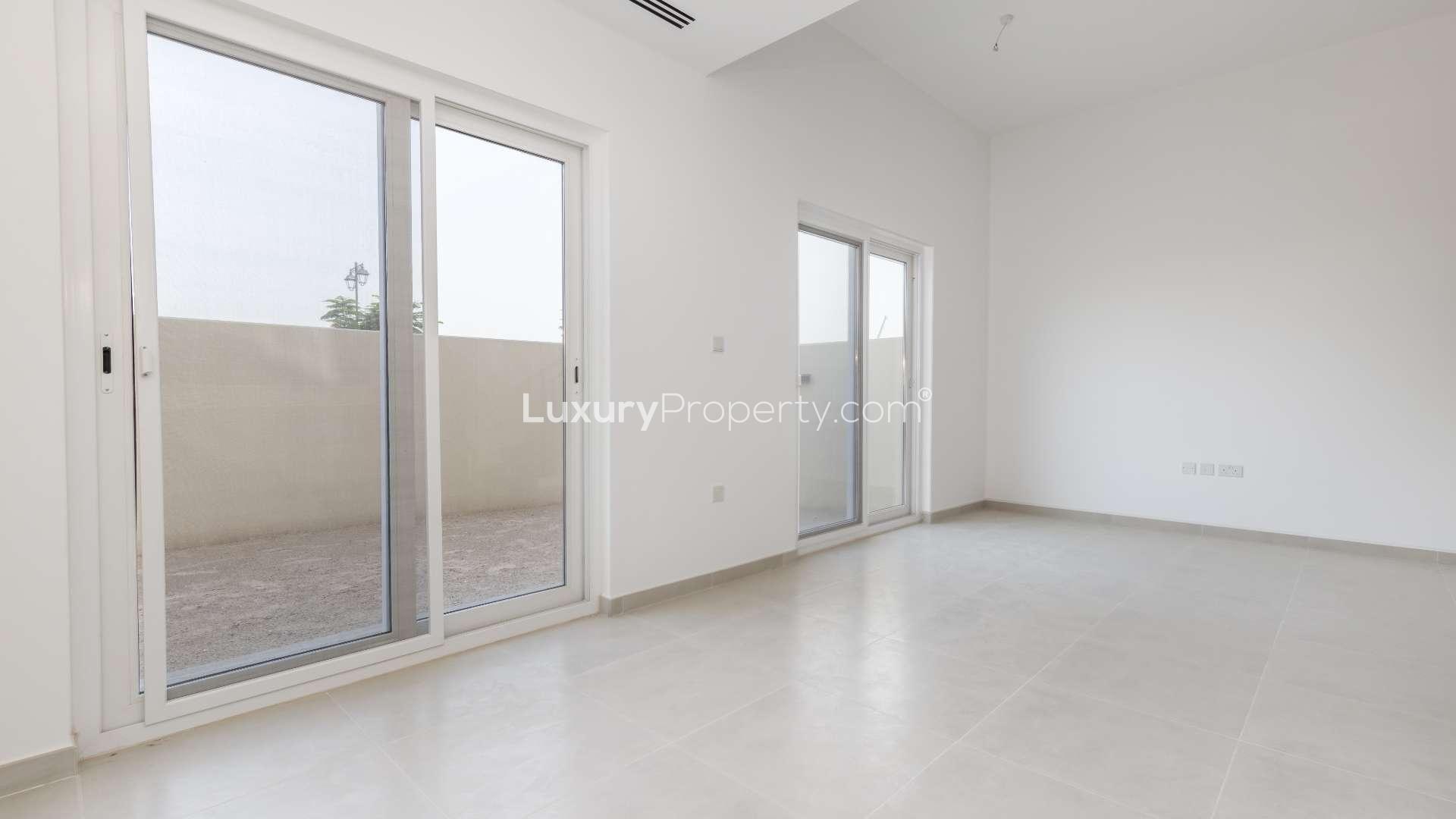 Modern interior of 4-bedroom townhouse in Villanova, Dubai Land with open-plan layout