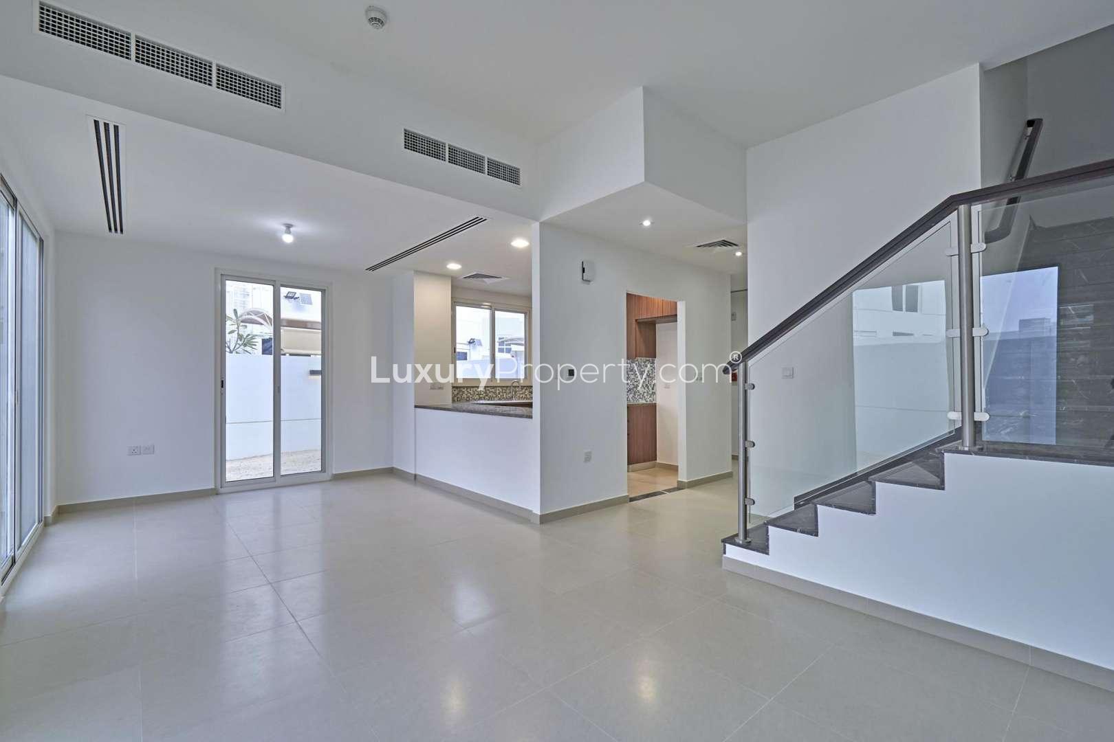 Spacious 4-bedroom townhouse exterior in Arabella 3, Mudon with modern design and garden space