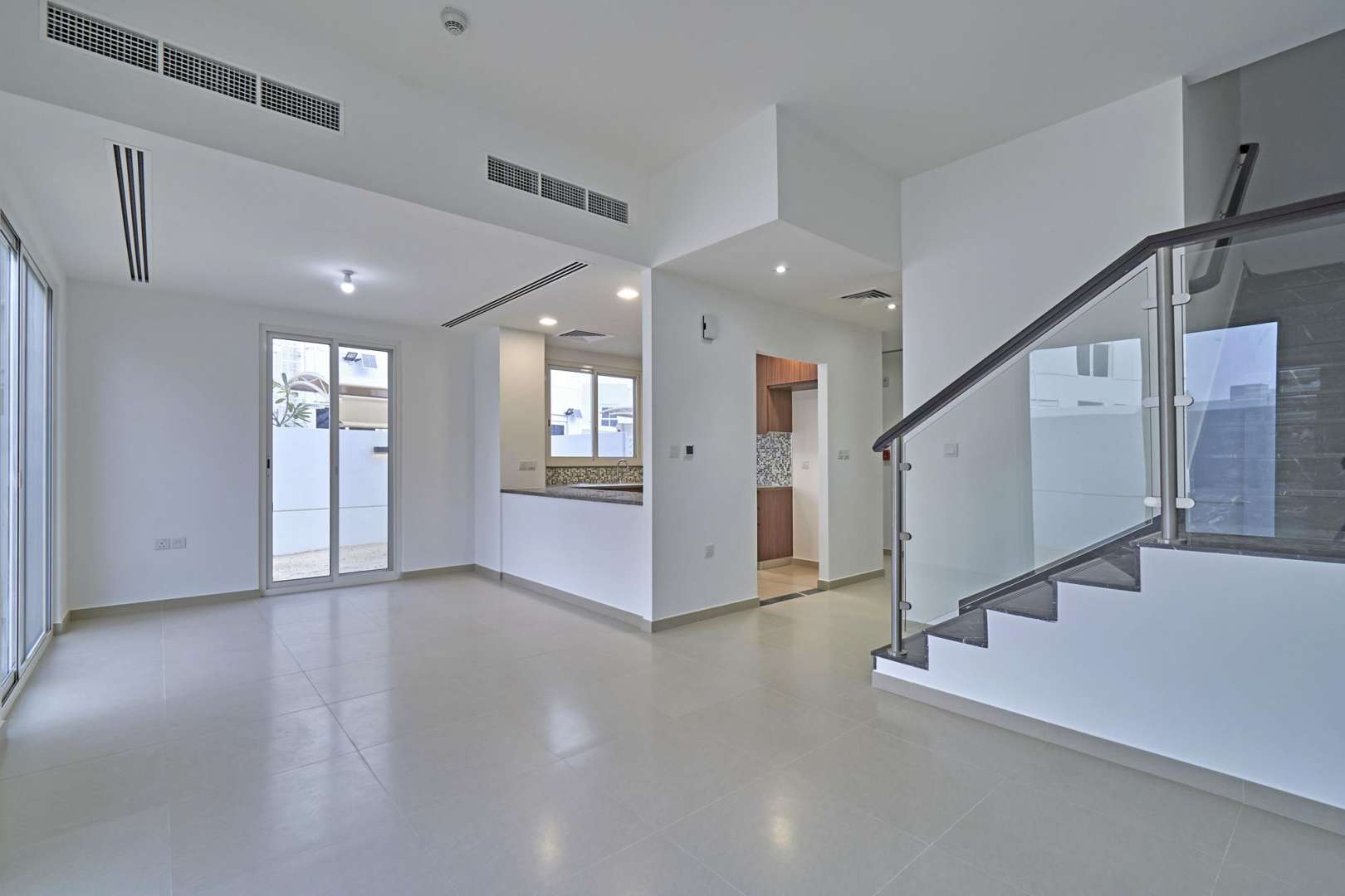 Spacious 4-bedroom townhouse exterior in Arabella 3, Mudon with modern design and garden space