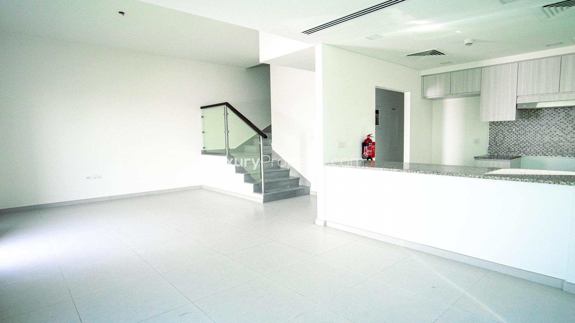 Modern kitchen with granite countertops in 4-bedroom Mudon townhouse for rent, Arabella Townhouses