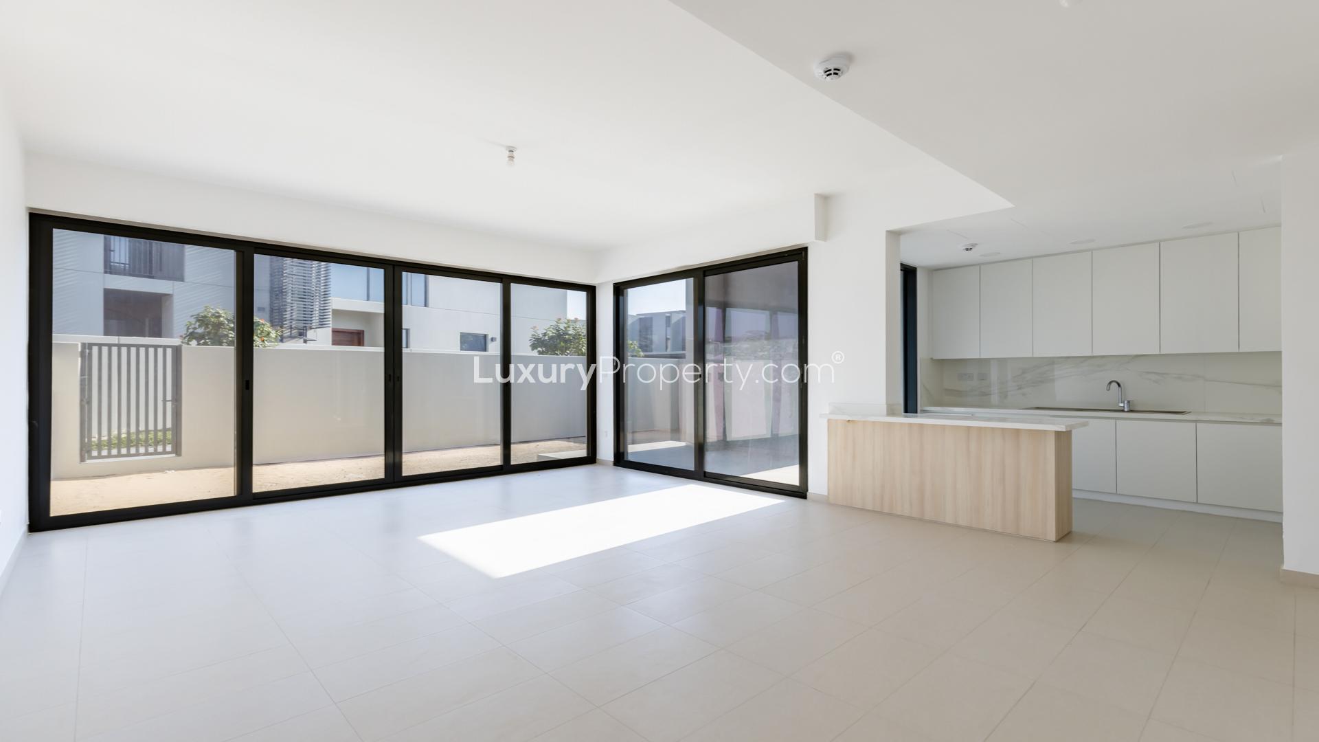 Modern 4-bedroom townhouse exterior in Cherrywoods, Dubai Land, for sale. Ref No: LP39507