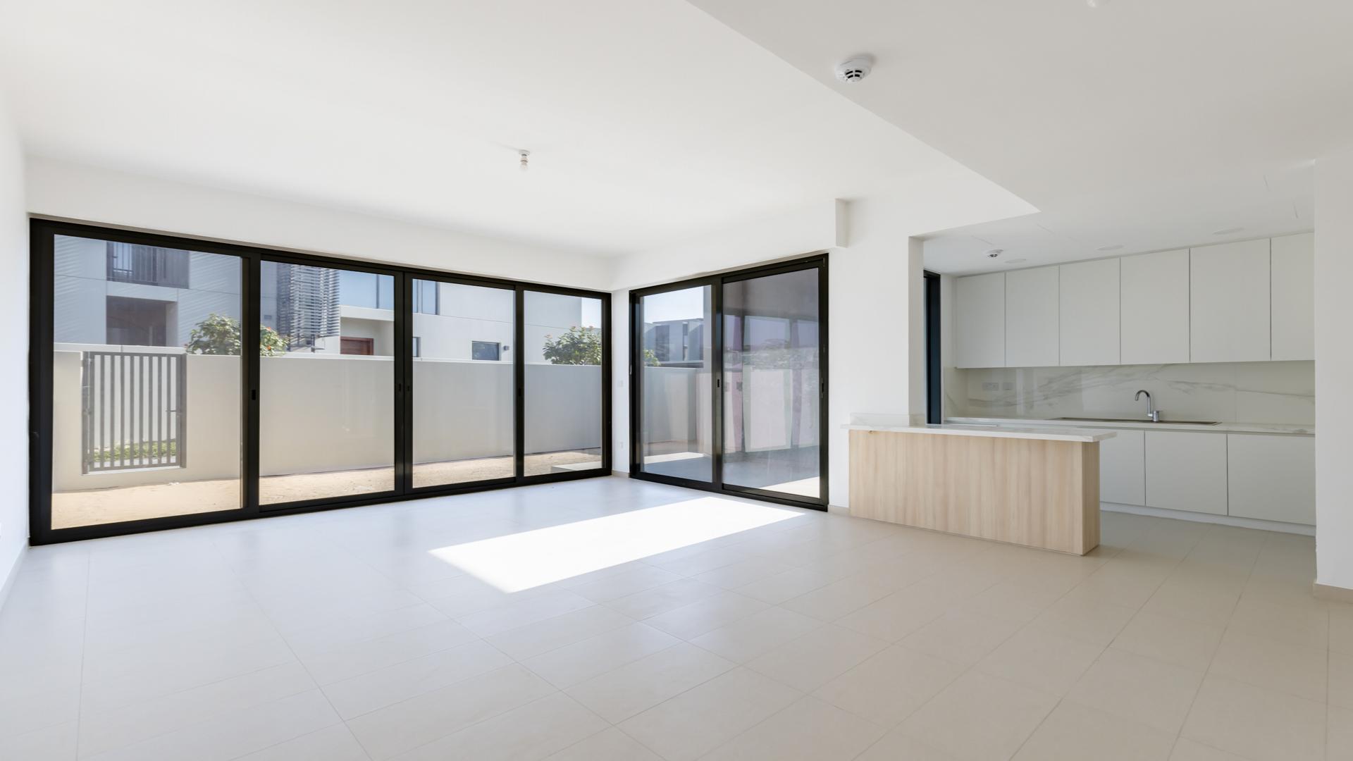 Modern 4-bedroom townhouse exterior in Cherrywoods, Dubai Land, for sale. Ref No: LP39507