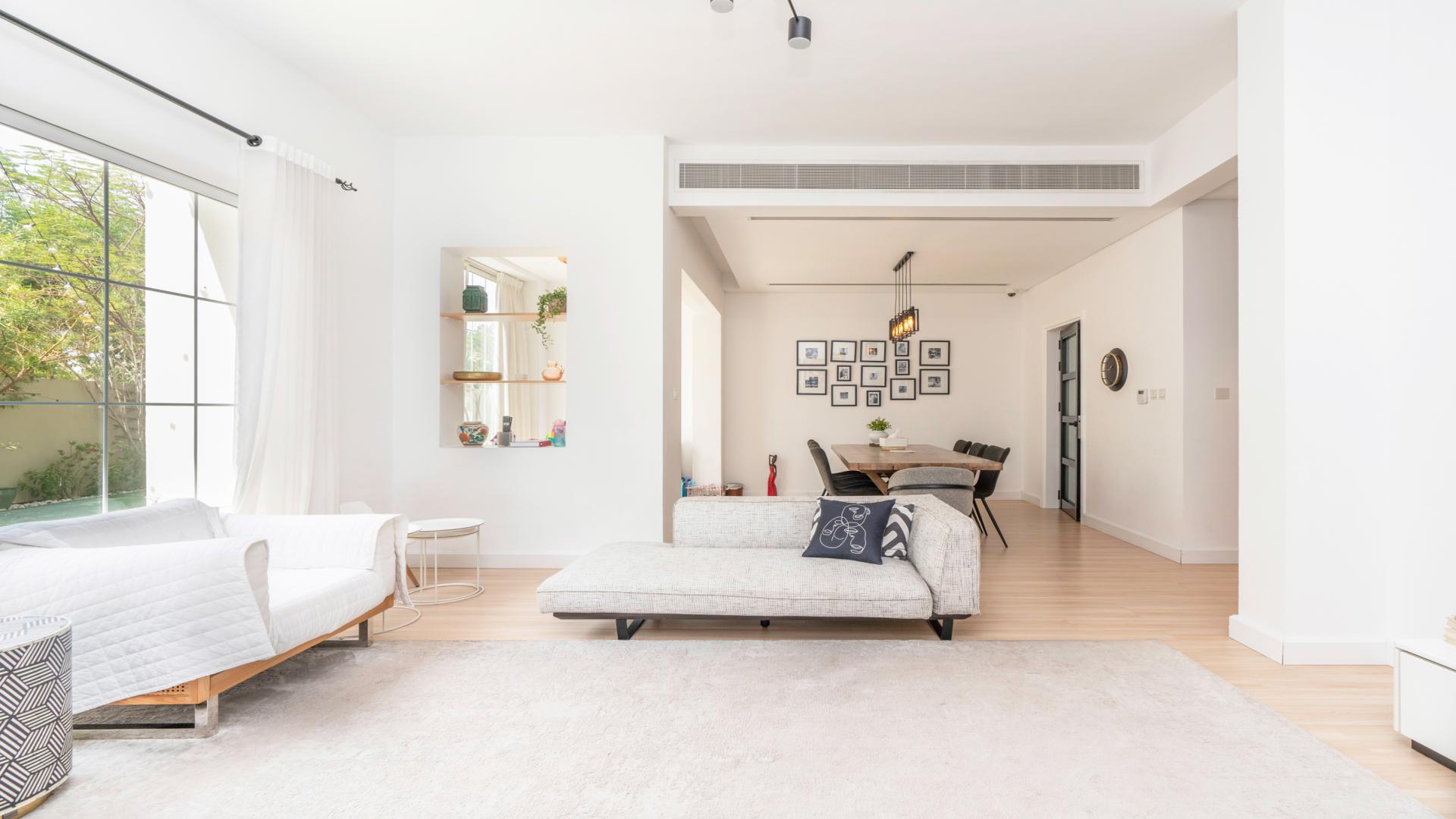 Spacious living and dining area in Azalea villa, Arabian Ranches 2, with modern decor