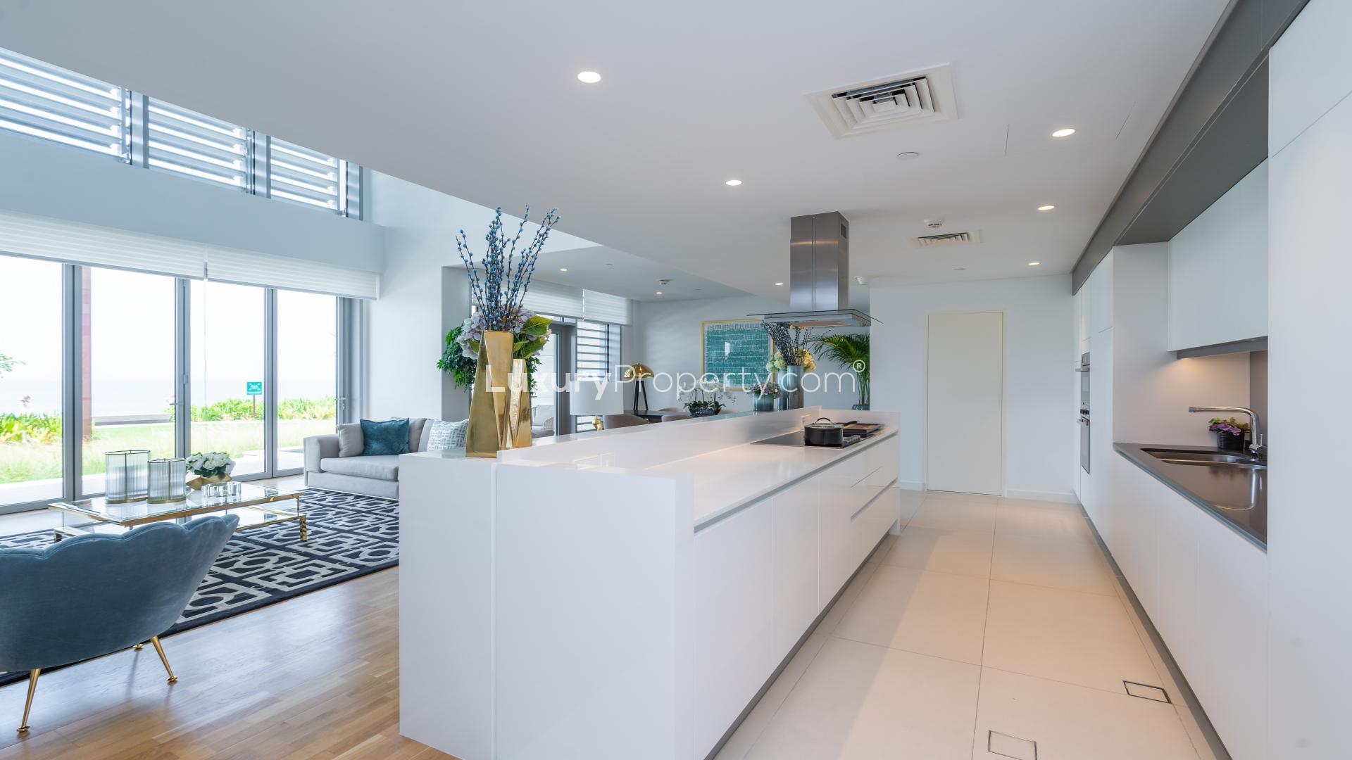 Luxurious Bluewaters townhouse exterior with modern design and lush landscaping for rent