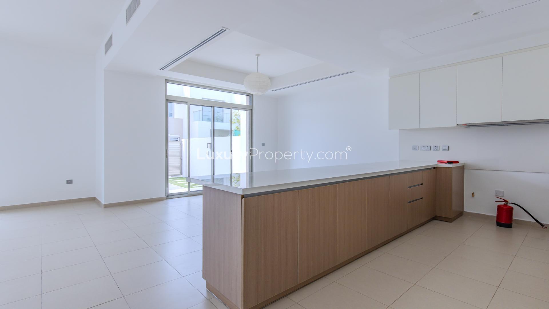 Modern kitchen interior in 4-bedroom townhouse, Reem Community, Arabian Ranches 2, for rent