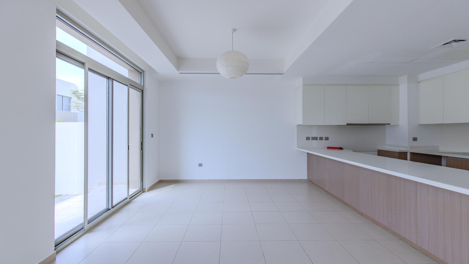 Modern townhouse exterior in Reem Community, Arabian Ranches 2, available for rent