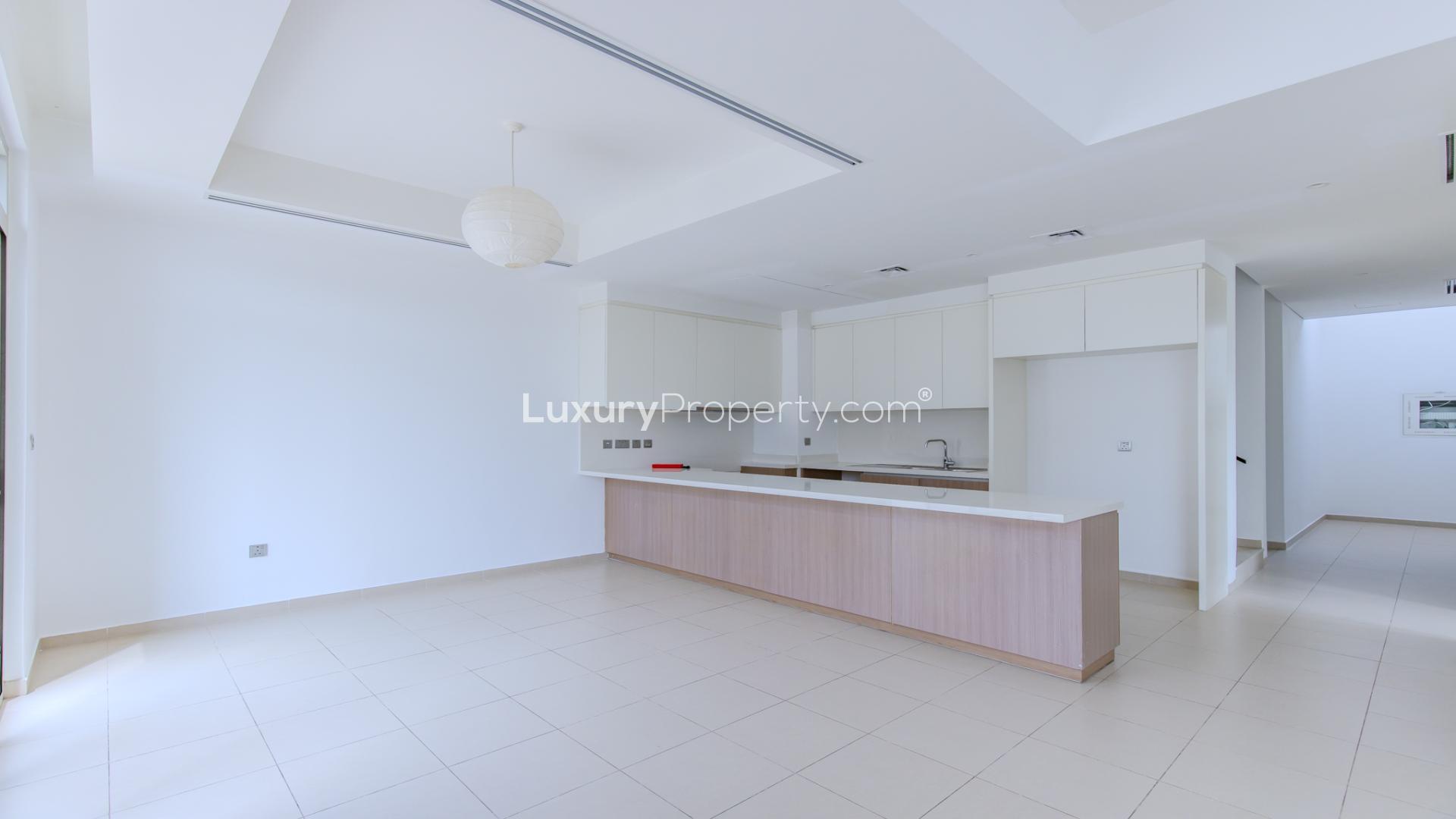 Modern kitchen in 4-bedroom townhouse, Arabian Ranches 2, Reem Community, available for rent
