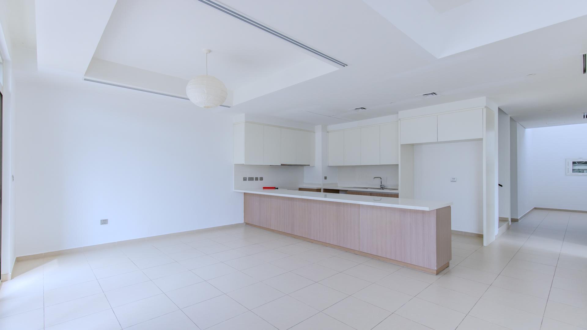 Modern kitchen in 4-bedroom townhouse, Arabian Ranches 2, Reem Community, available for rent