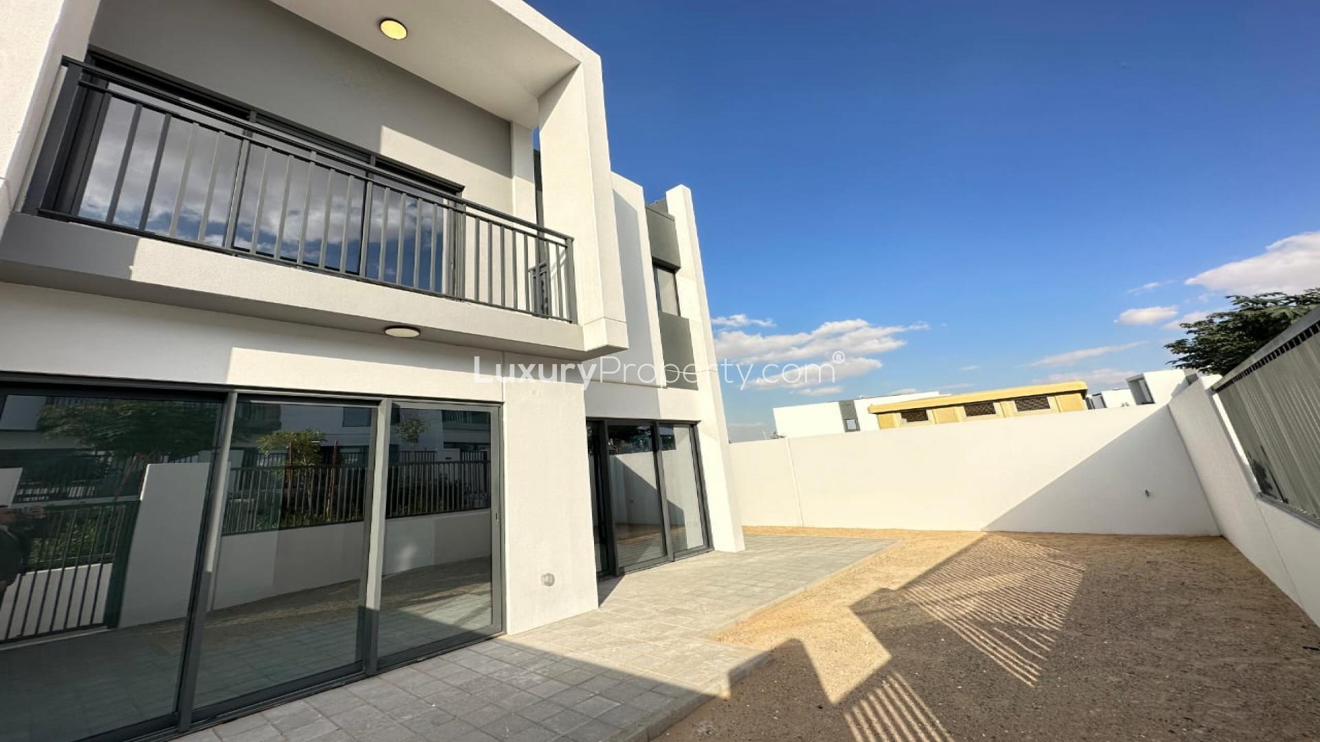 Exterior of 4-bedroom townhouse with patio in Villanova, Dubai Land, for rent