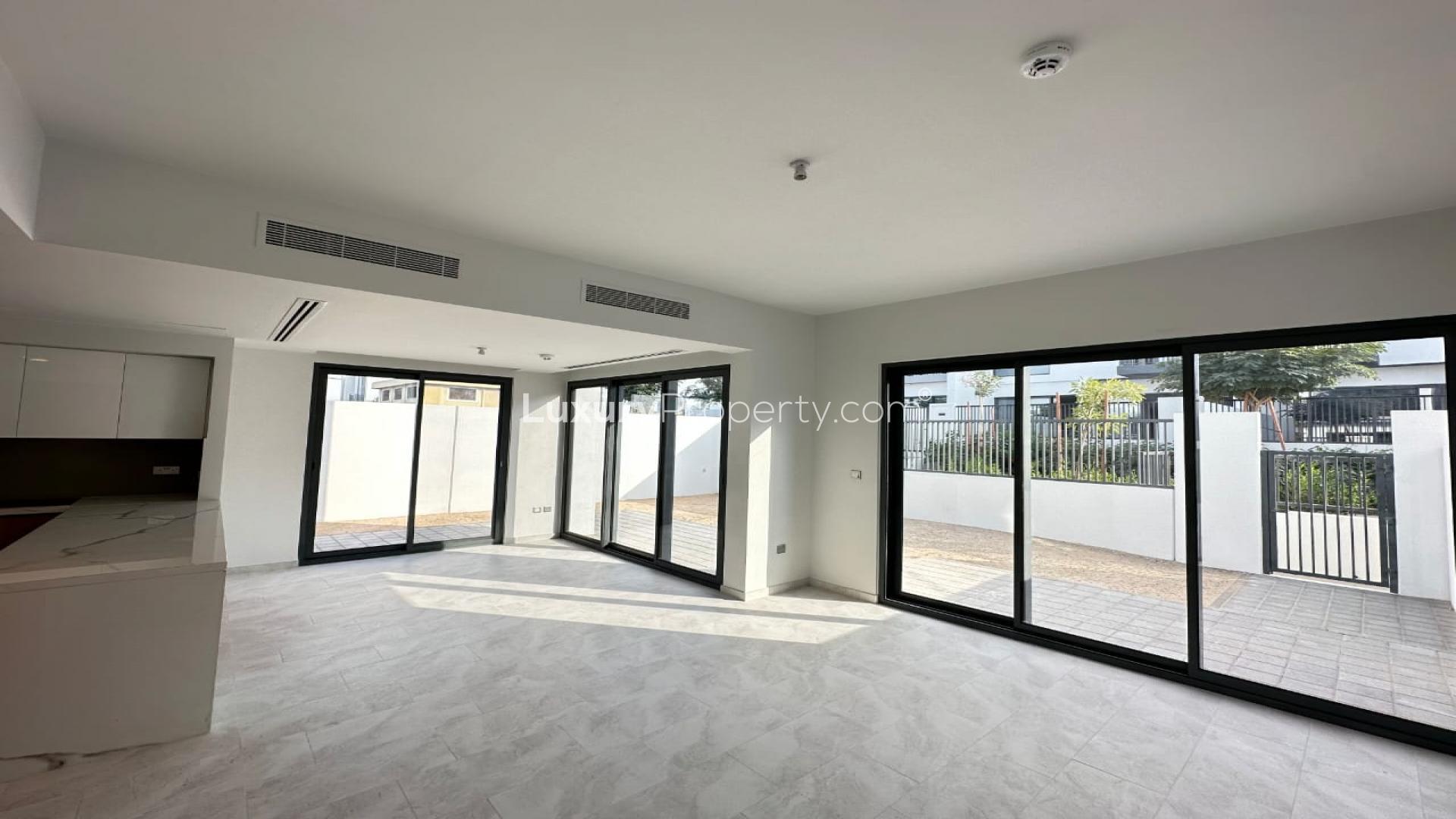 N/A,Spacious living area with large windows in La Rosa townhouse, Villanova, Dubai Land