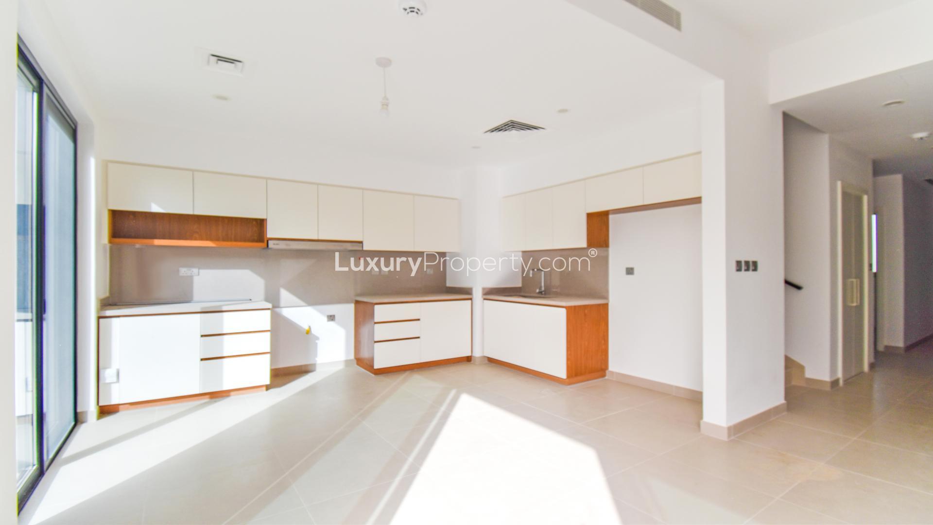 Brand new four-bedroom townhouse kitchen and living area, Camelia, Arabian Ranches 2