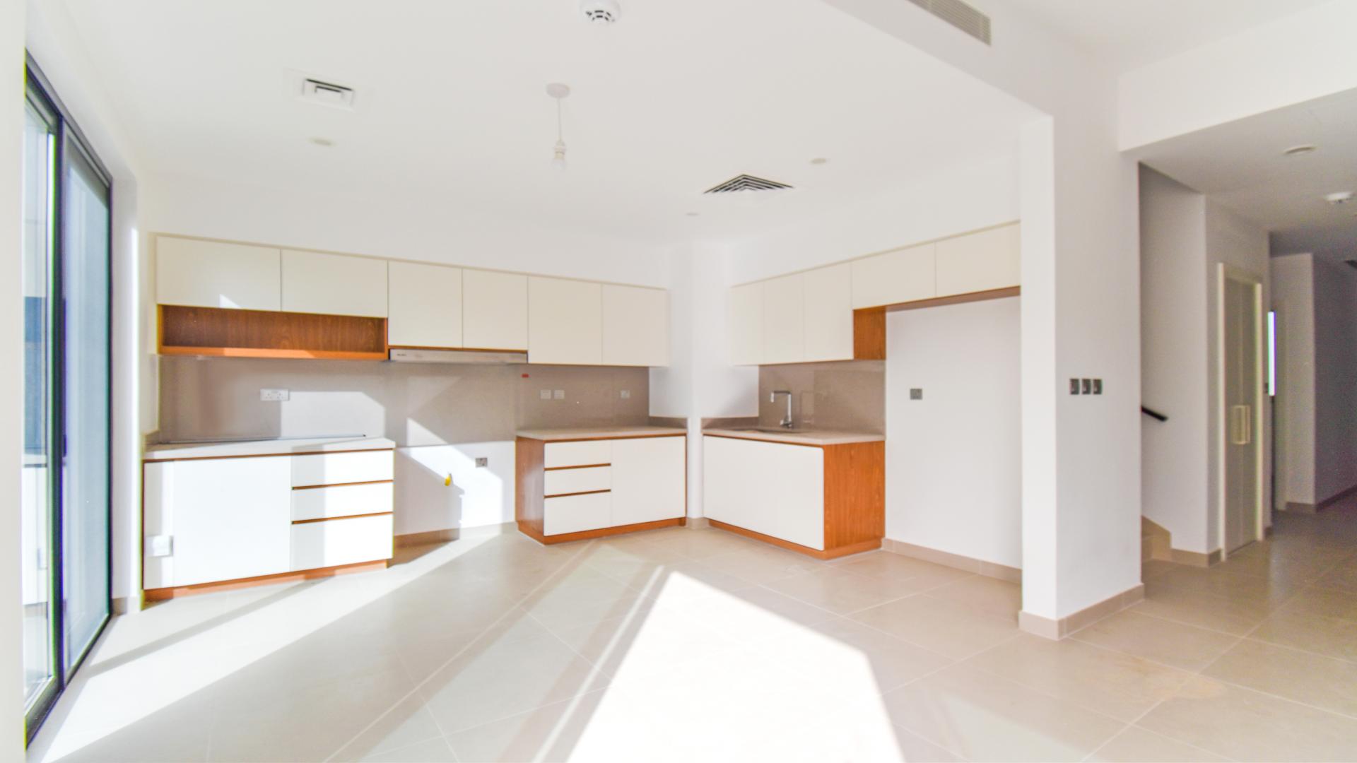 Brand new four-bedroom townhouse kitchen and living area, Camelia, Arabian Ranches 2