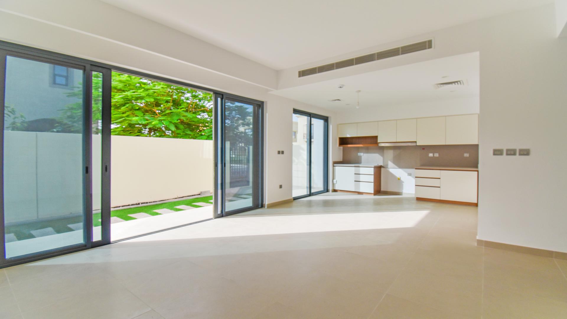"Bright open-plan kitchen and living area in Camelia townhouse, Arabian Ranches 2.",Modern kitchen in brand new 4-bedroom townhouse, Camelia, Arabian Ranches 2. Ready to rent