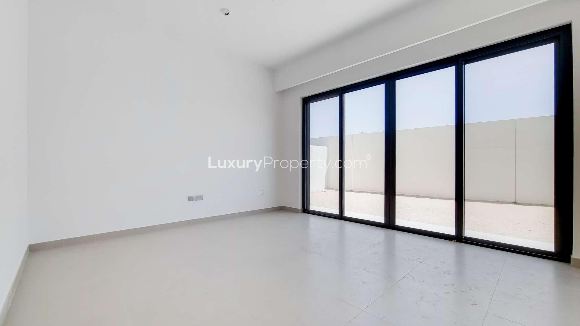 Modern kitchen and living area in Camelia townhouse, Arabian Ranches 2, for rent