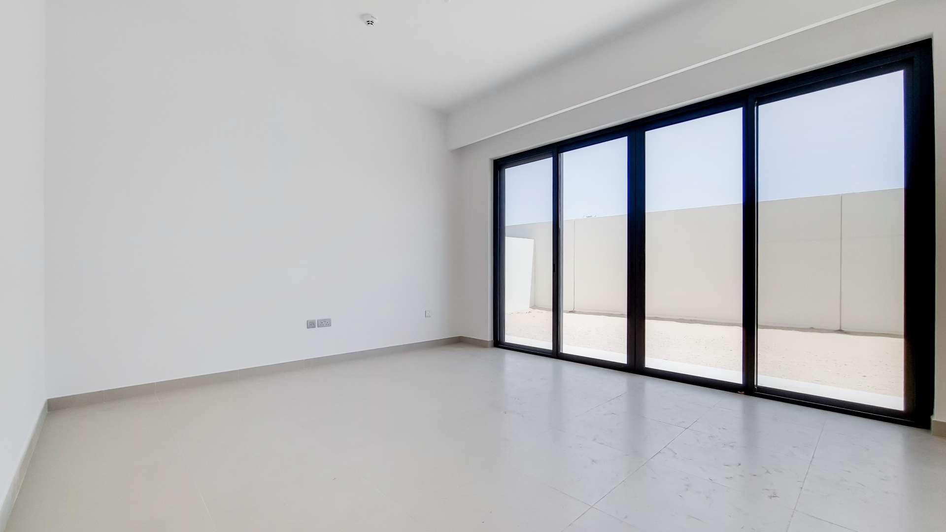 Modern kitchen and living area in Camelia townhouse, Arabian Ranches 2, for rent