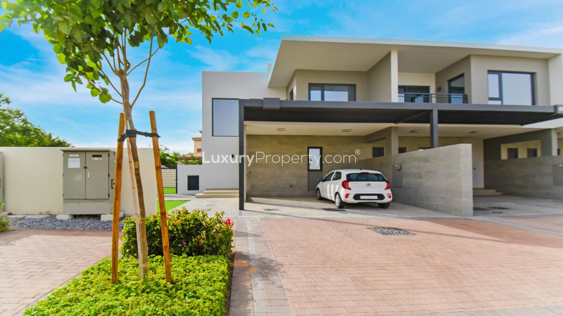 Bright open-plan kitchen and living area in Camelia townhouse, Arabian Ranches 2