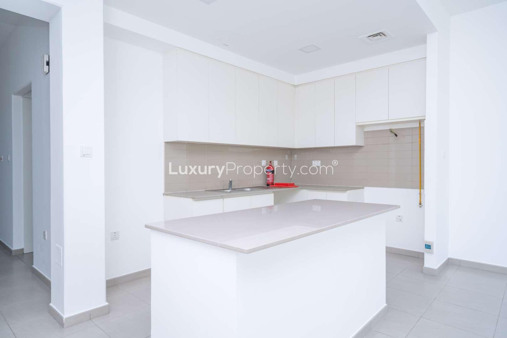 Modern kitchen and living area in 4-bedroom townhouse, Hayat, Town Square for rent