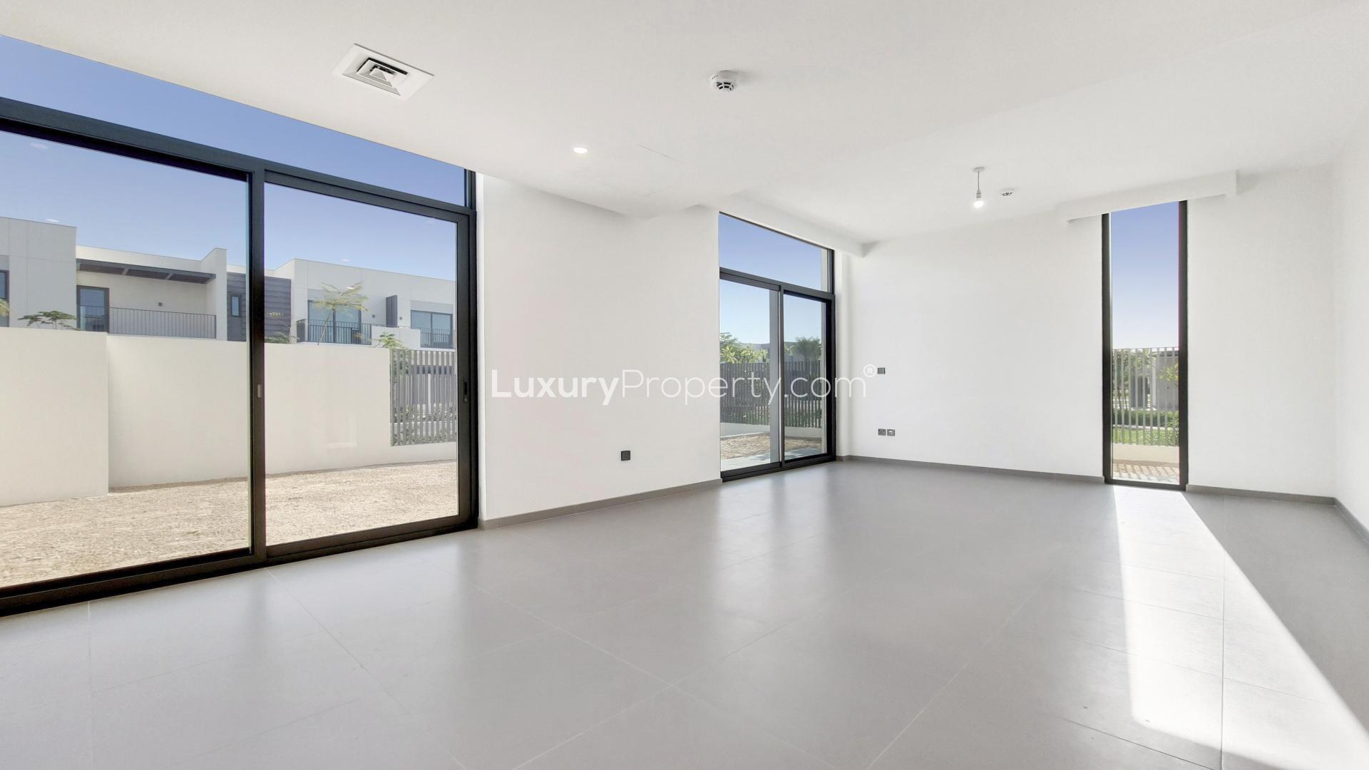 Modern kitchen and living area in 4-bedroom villa, Arabian Ranches 3, Dubai