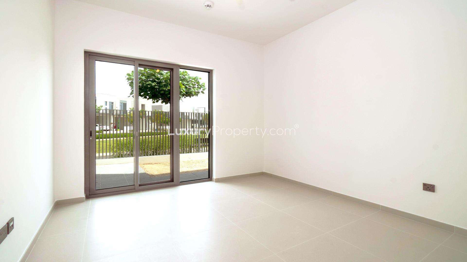 Spacious living room with large windows in Joy, Arabian Ranches 3 villa for rent