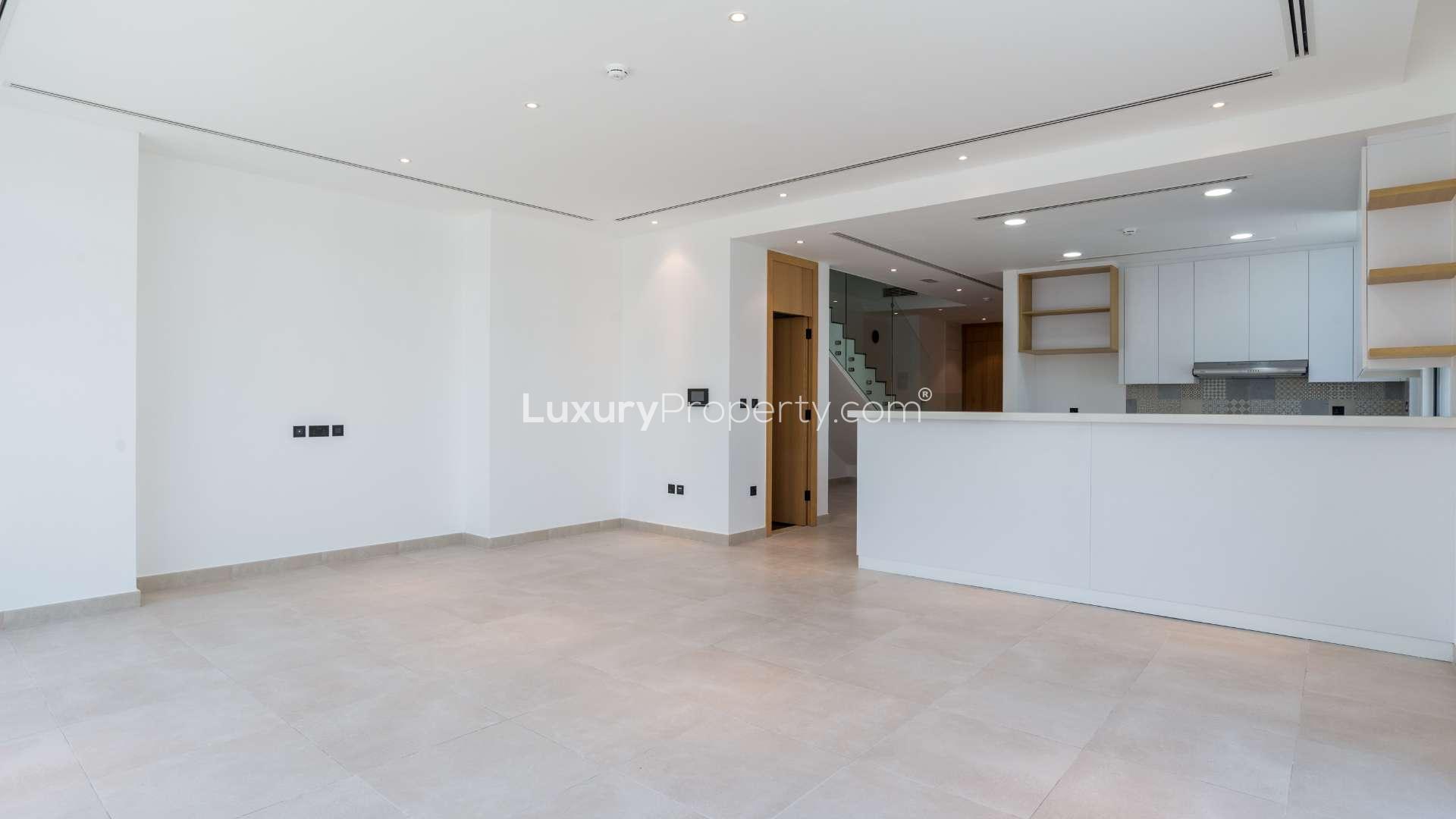 Staircase and hallway in four-bedroom townhouse, Jumeirah Golf Estates, available for rent