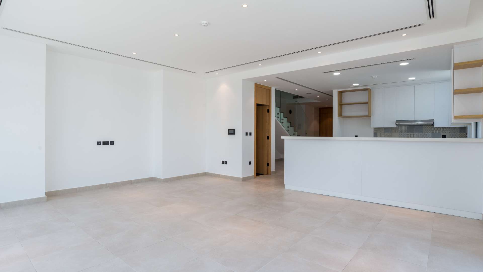 Staircase and hallway in four-bedroom townhouse, Jumeirah Golf Estates, available for rent