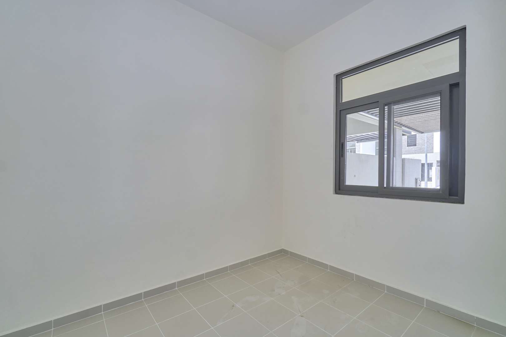 Modern kitchen in 4-bedroom townhouse, Juniper, Damac Hills 2, available for rent