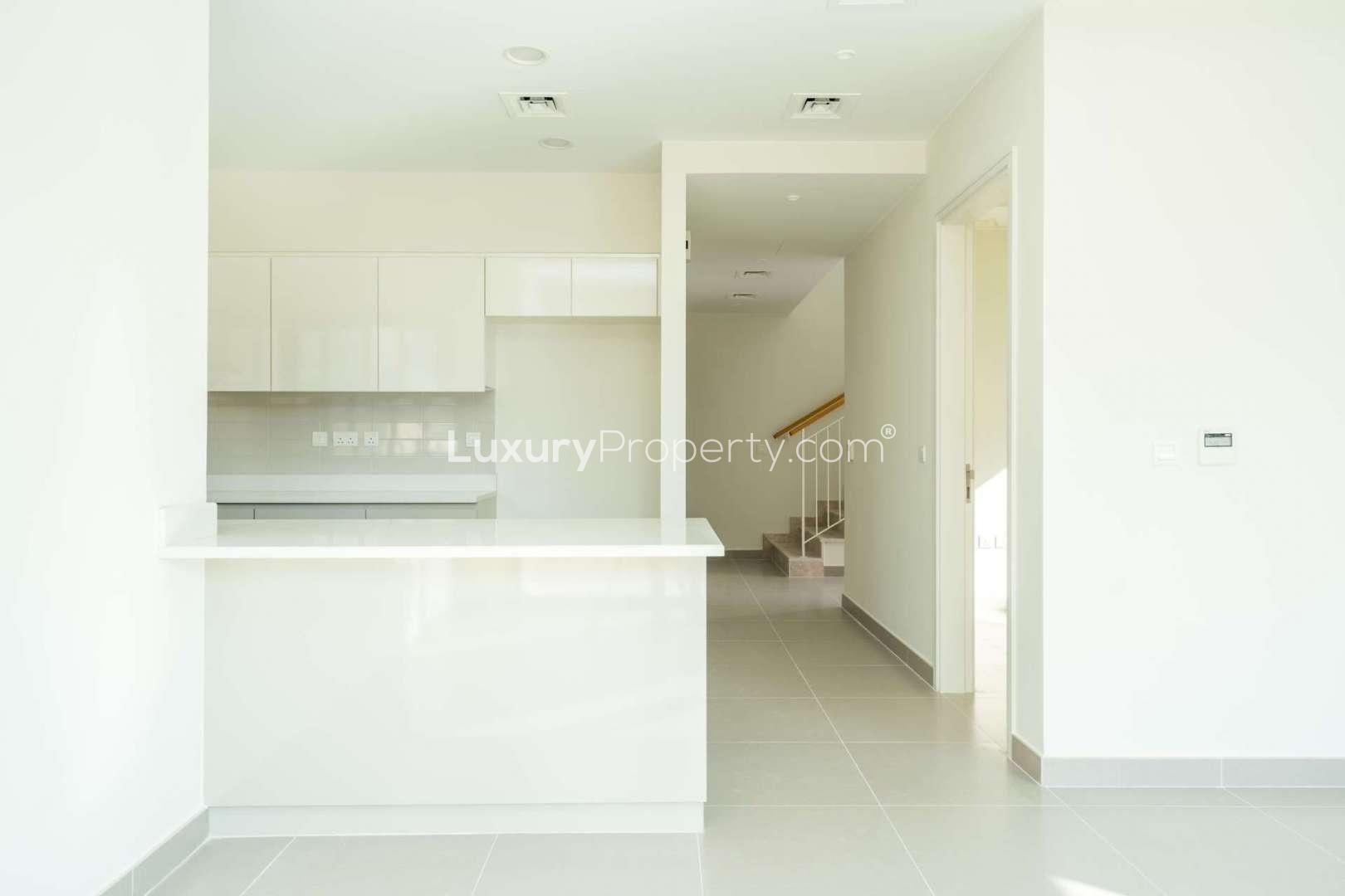 Modern kitchen and dining area in 4-bedroom townhouse, Maple 3, Dubai Hills Estate