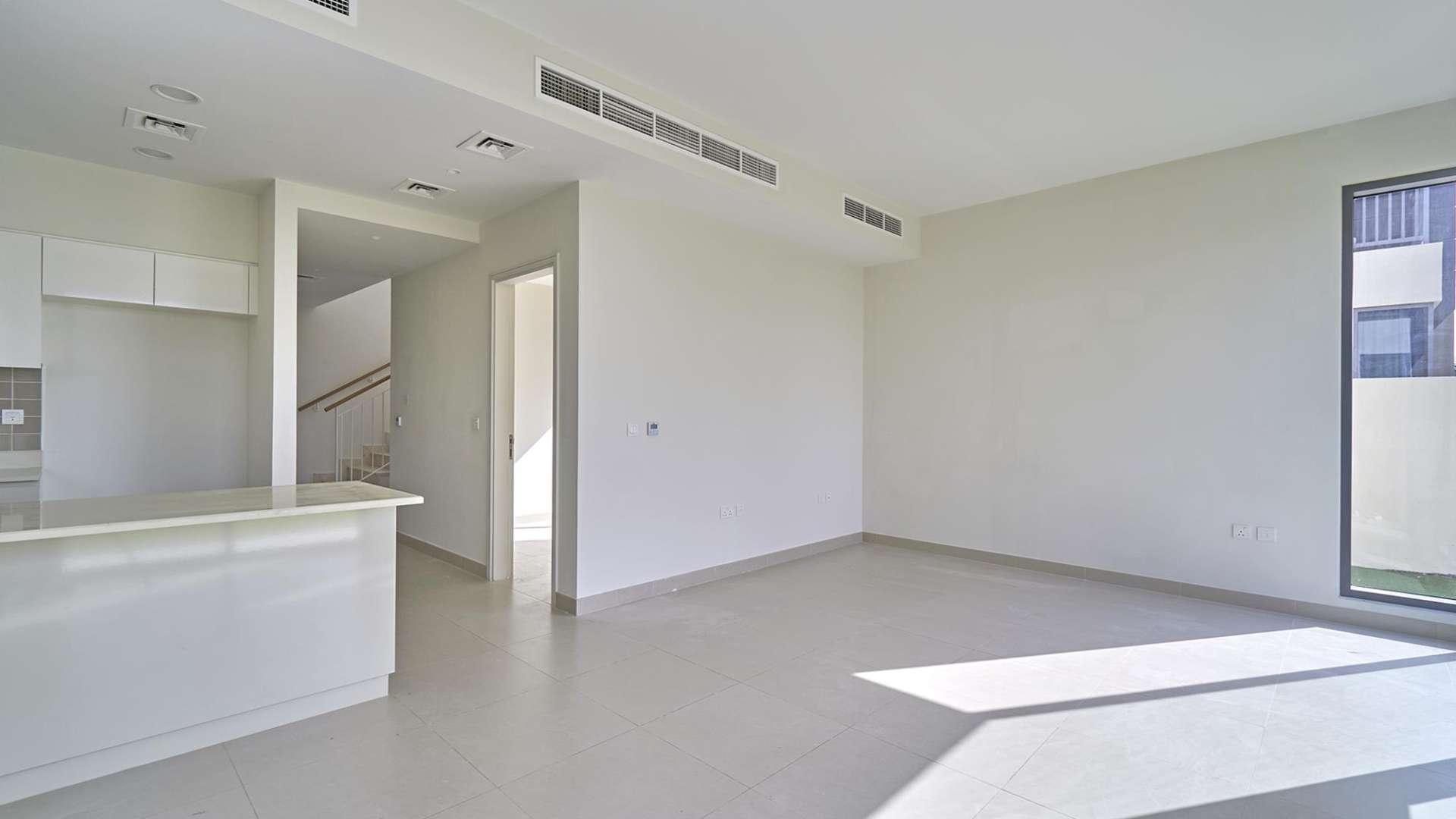 Modern kitchen and living area in Maple townhouse, Dubai Hills Estate, for rent