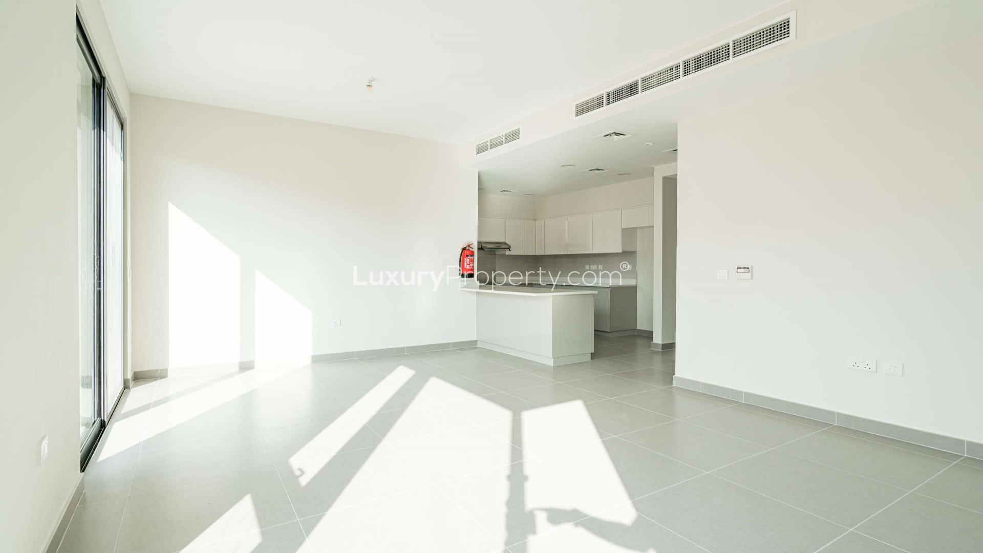N/A,Spacious living area with modern kitchen in Dubai Hills Estate townhouse for rent