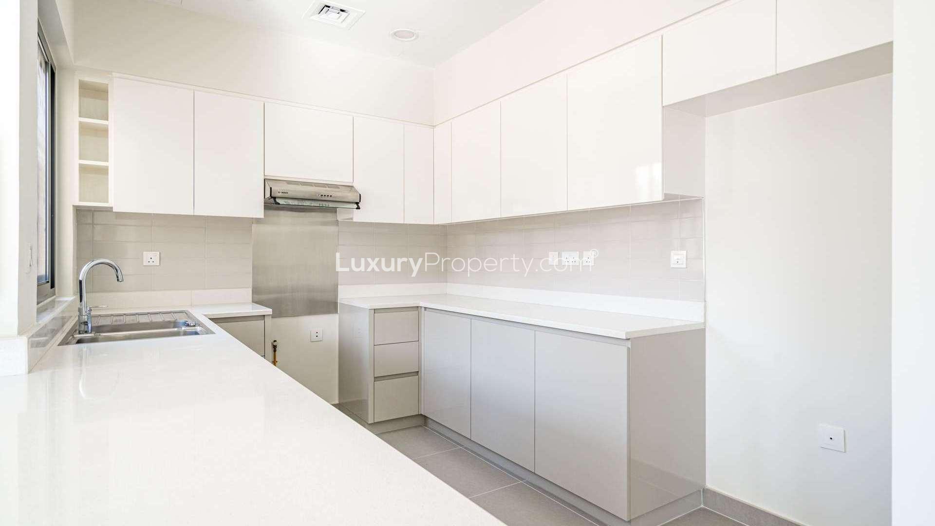 Exterior view of a modern 4-bedroom townhouse in Maple 1, Dubai Hills Estate