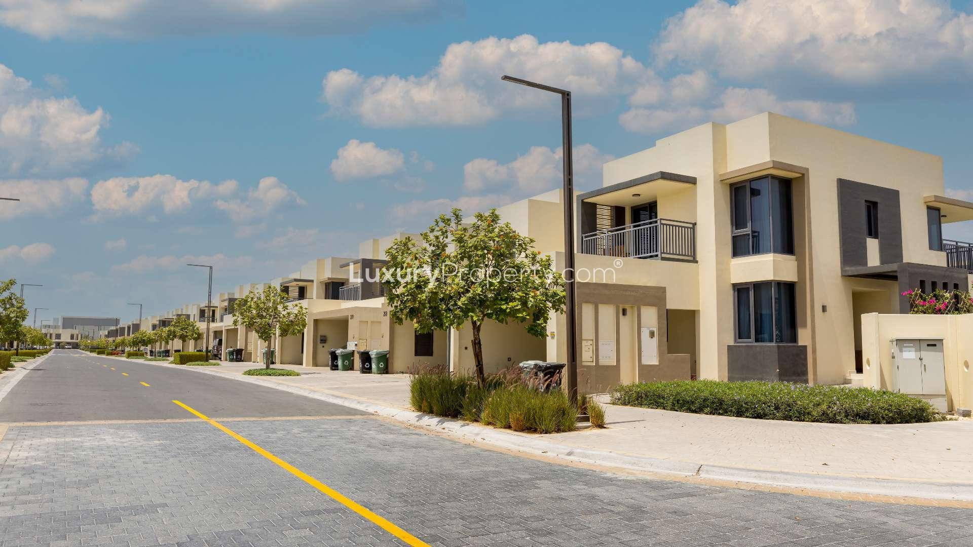 Living room in furnished townhouse, Maple at Dubai Hills Estate, blue sofas, large window