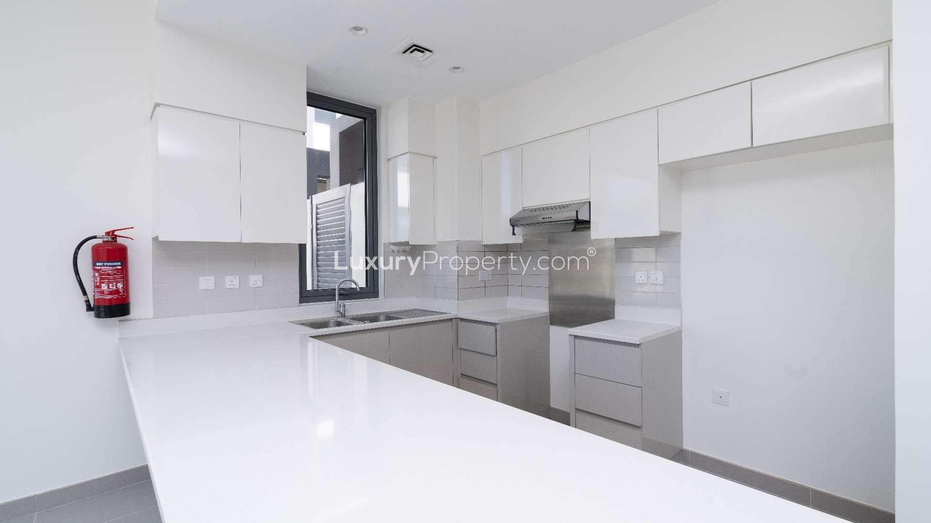 Modern kitchen and living area in 4-bedroom townhouse, Maple at Dubai Hills Estate