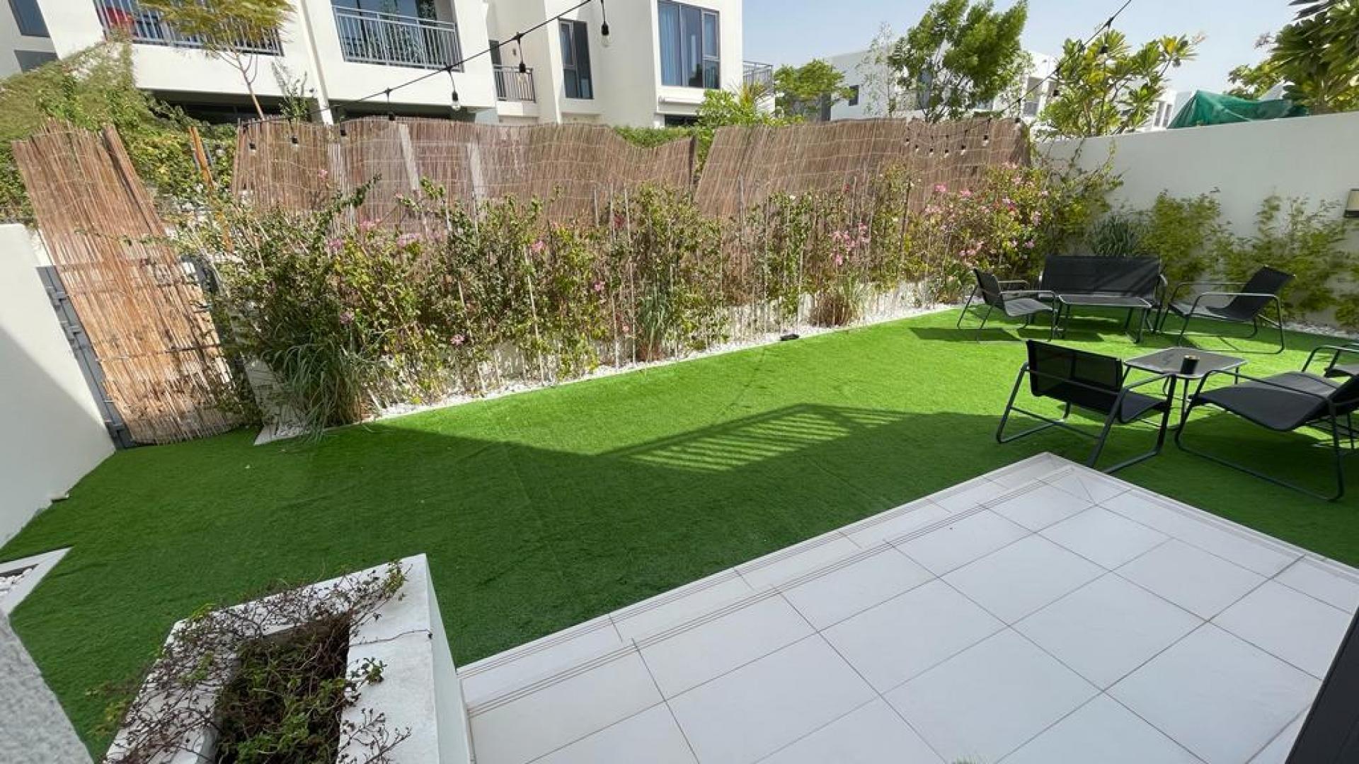 Bright room with sliding glass doors in 4-bedroom villa, Maple, Dubai Hills Estate