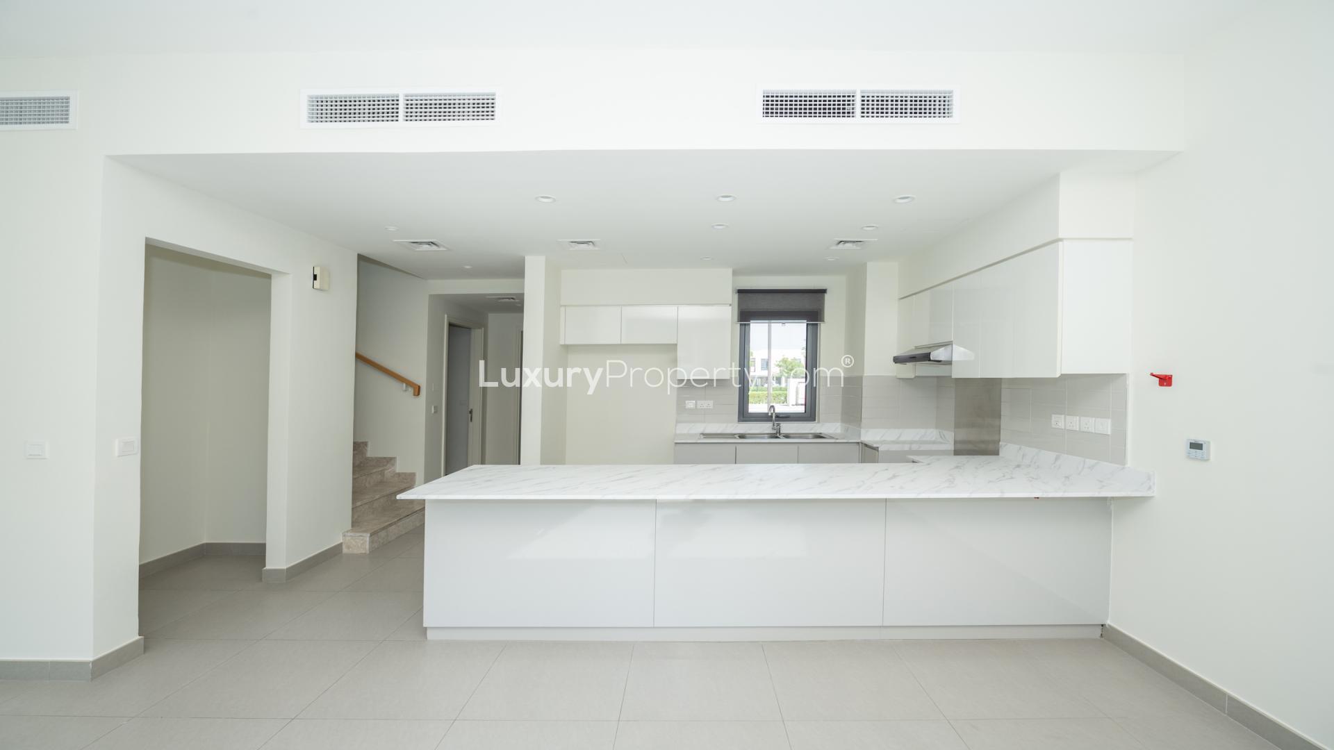 Bright living area with large windows in 4-bedroom villa, Maple at Dubai Hills Estate