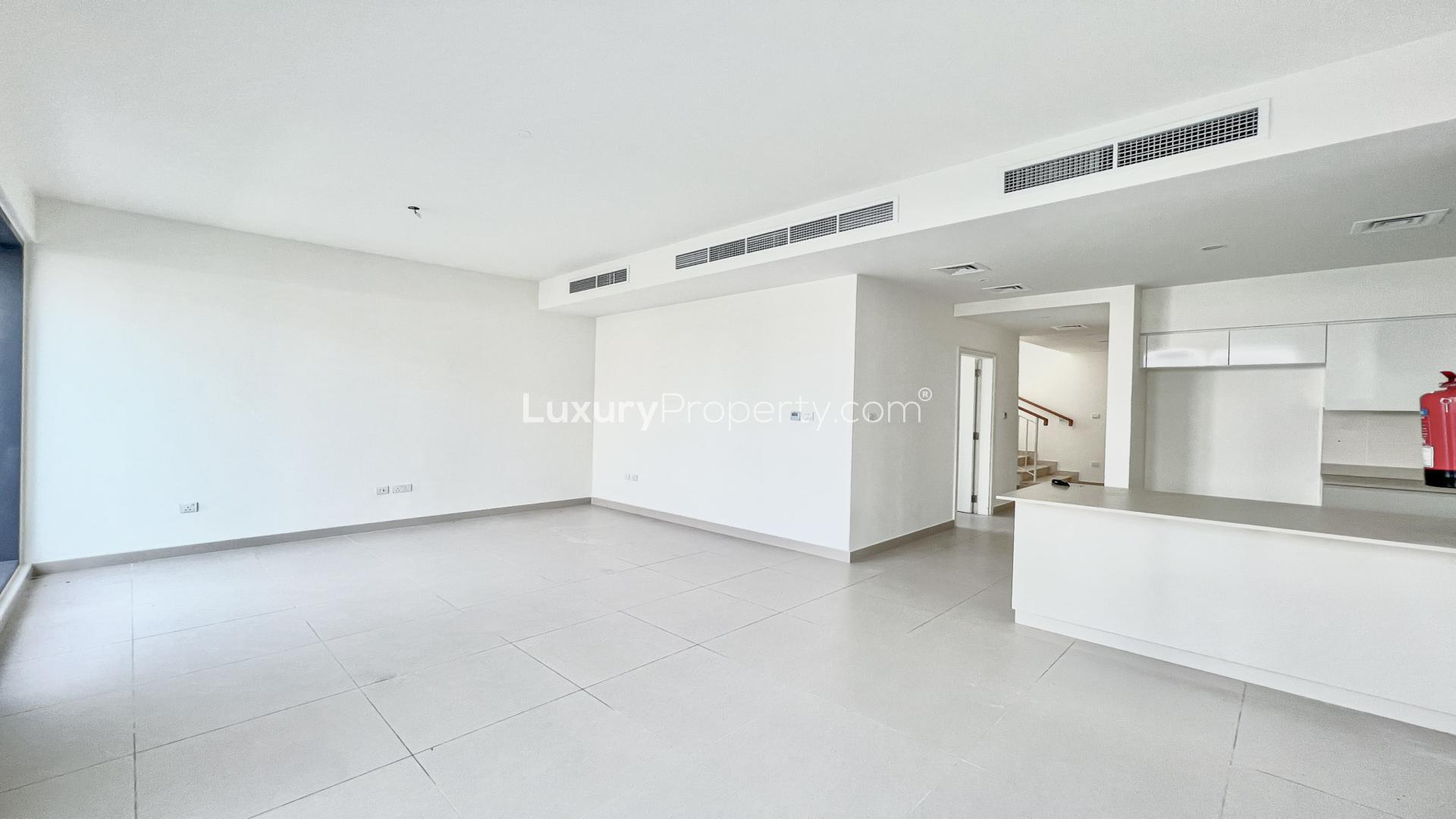 Spacious modern kitchen and living area in Dubai Hills Estate villa for rent