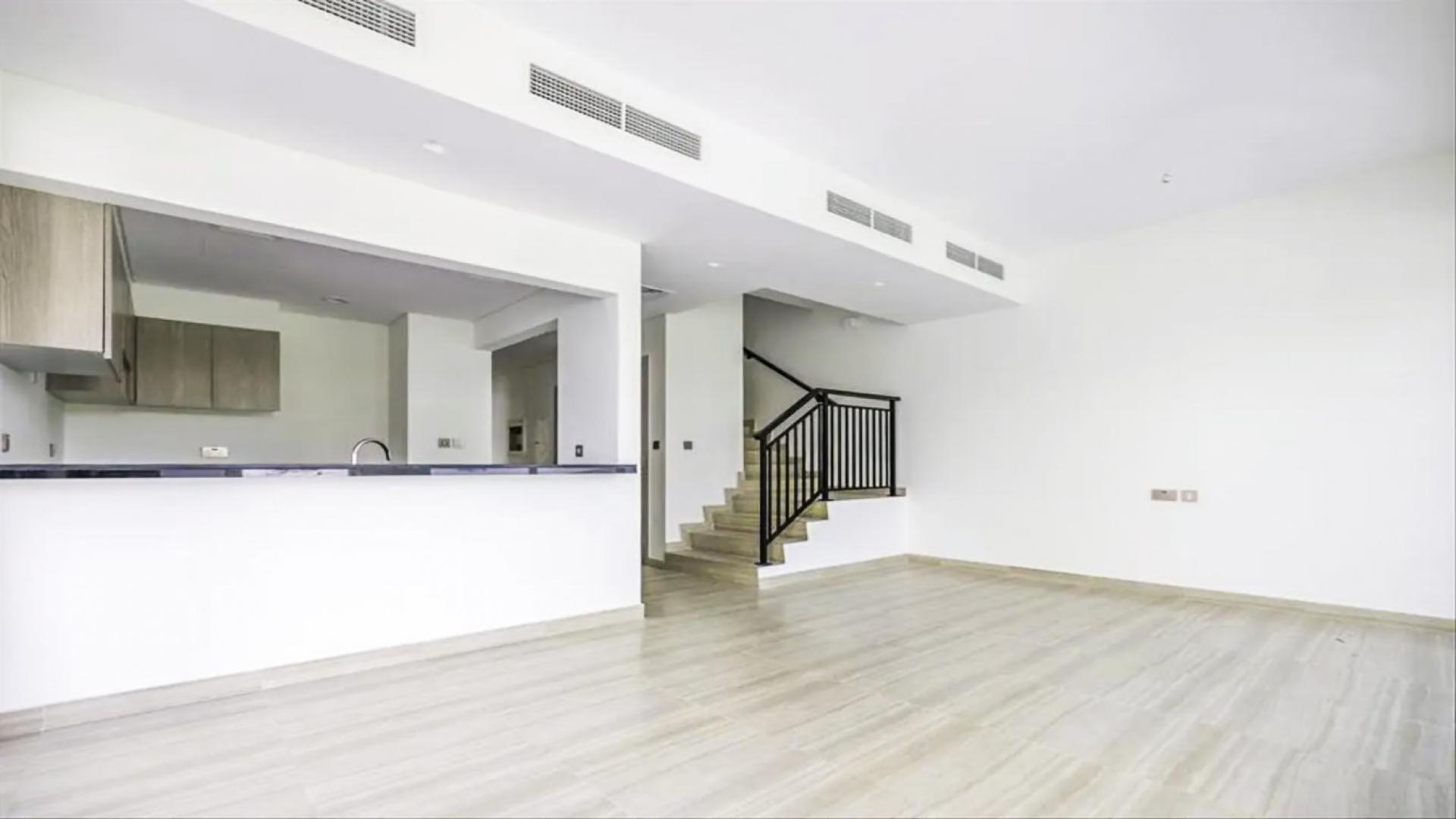 Bright living area with staircase in 4-bed townhouse, Park Residences, Damac Hills