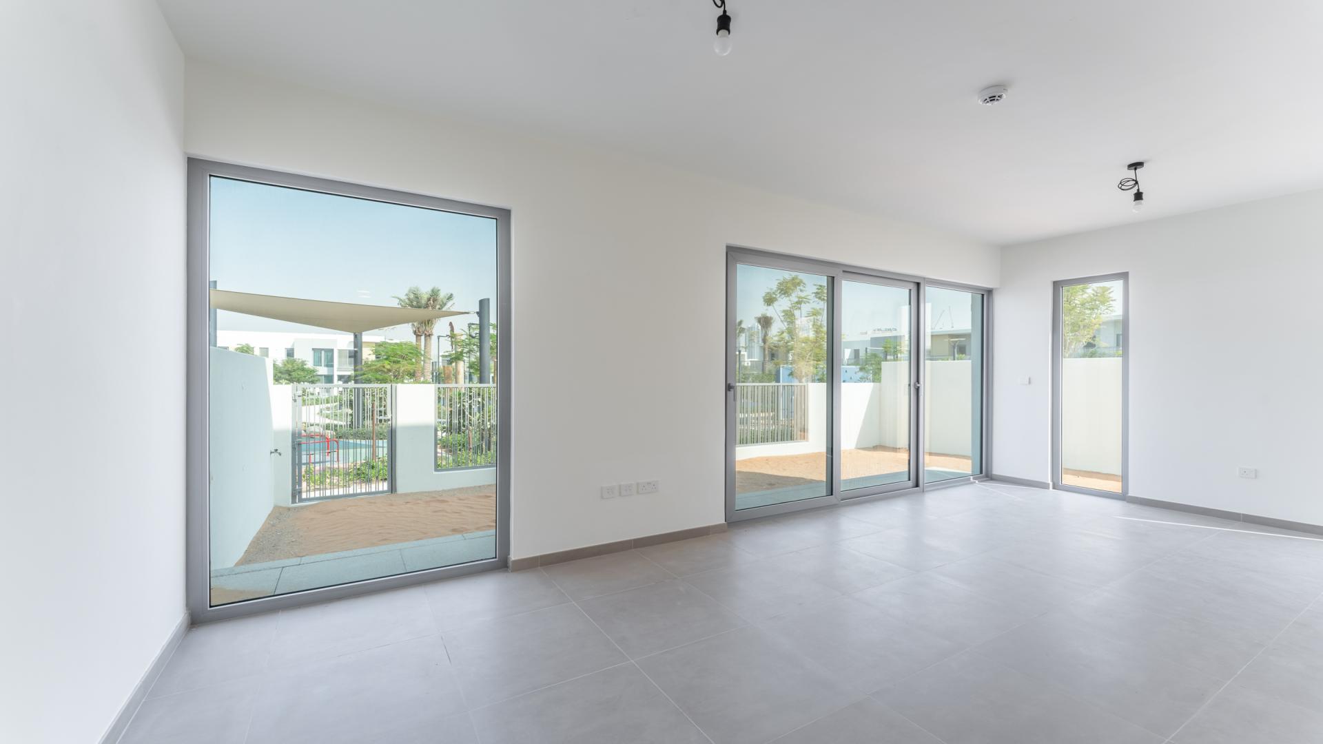 Modern 4-bedroom townhouse exterior in Elan, Tilal Al Ghaf community, available for rent