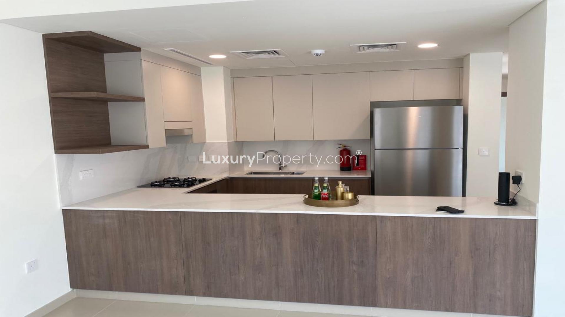 Modern 4-bedroom townhouse exterior in Tilal Al Ghaf, Elan community, available for rent