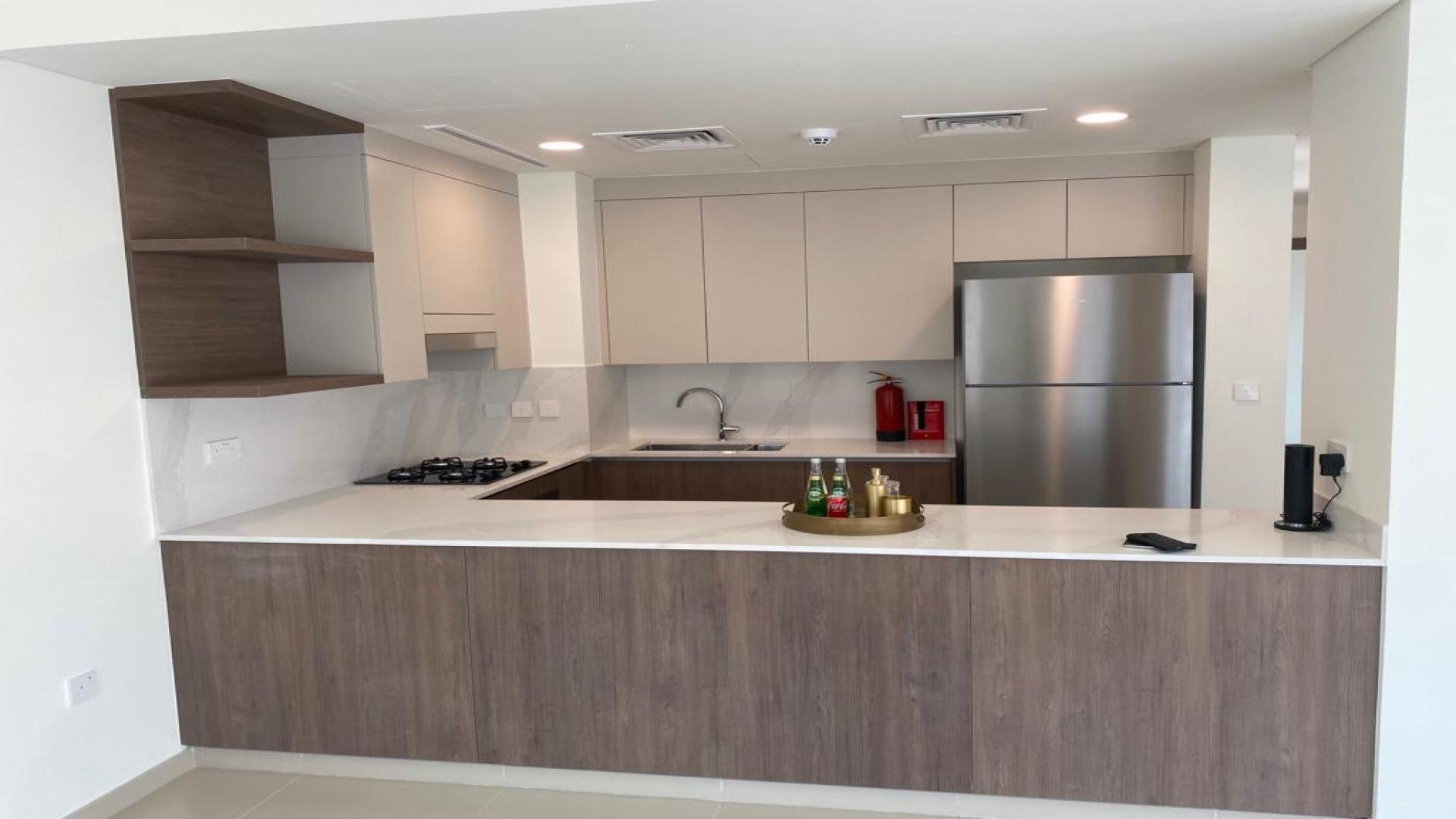 Modern 4-bedroom townhouse exterior in Tilal Al Ghaf, Elan community, available for rent