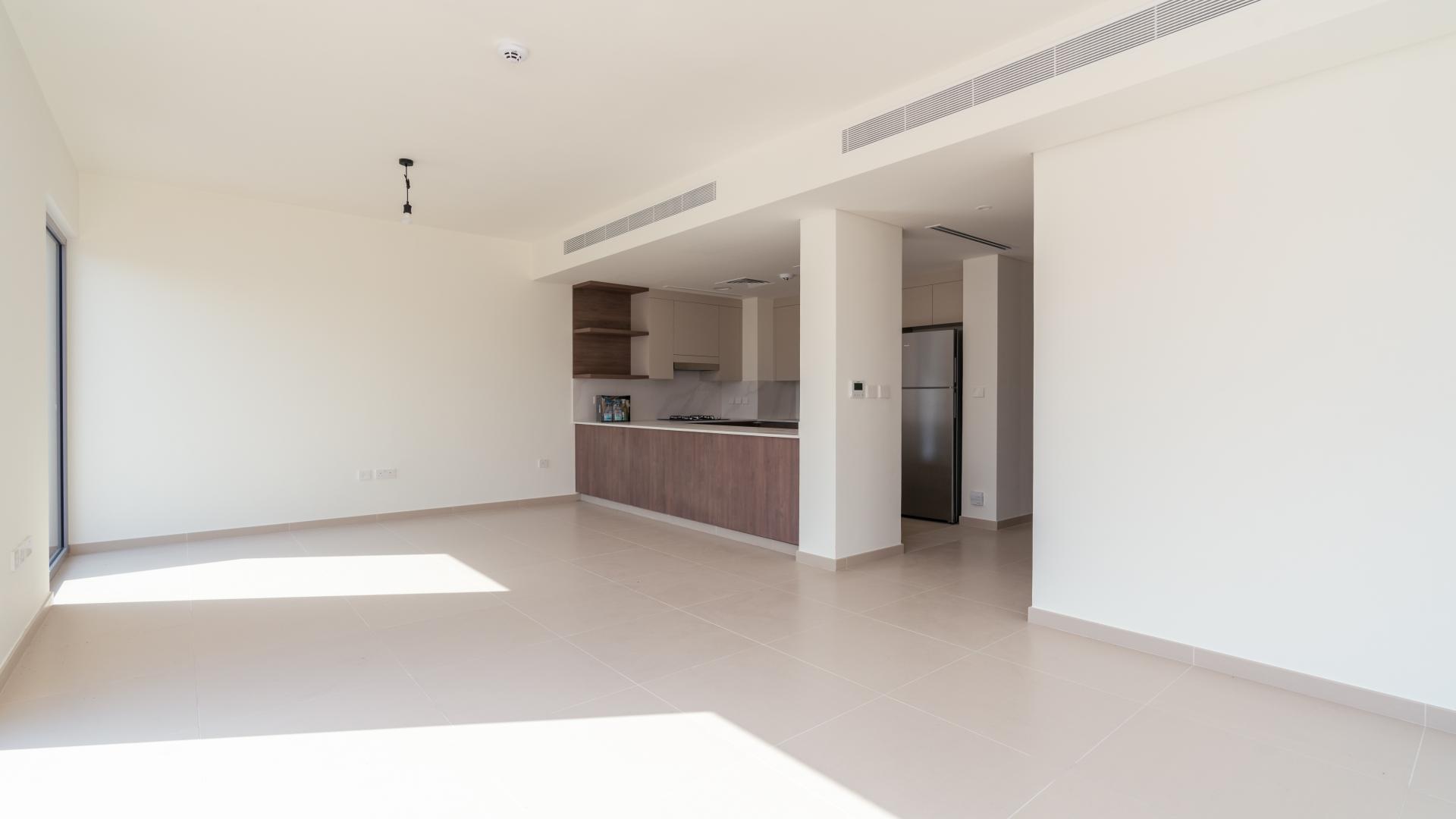 Luxurious townhouse interior with large windows, Tilal Al Ghaf, Dubai. Bright and spacious