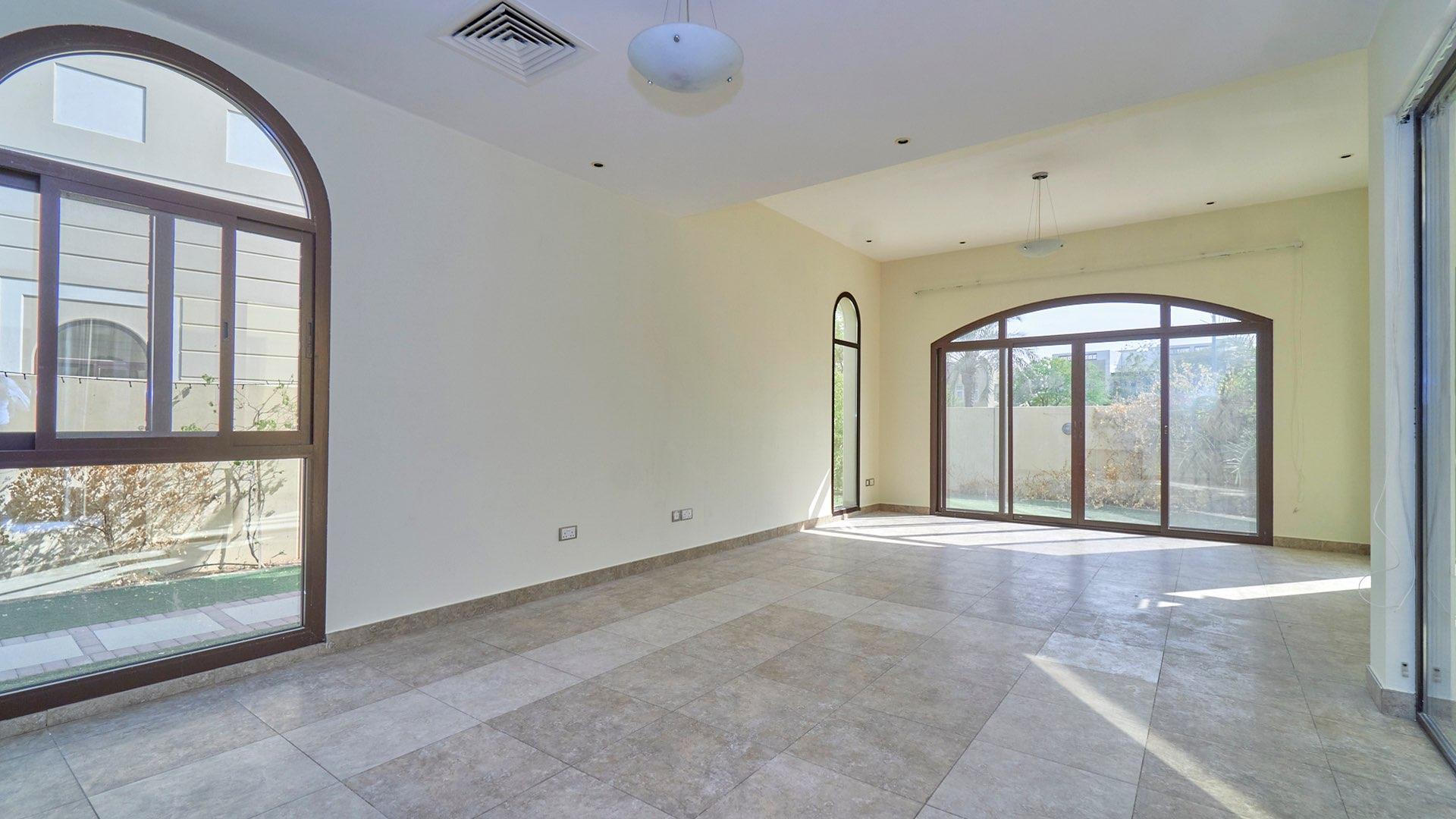 Spacious living room in four-bedroom townhouse, Mudon Naseem community, available for rent