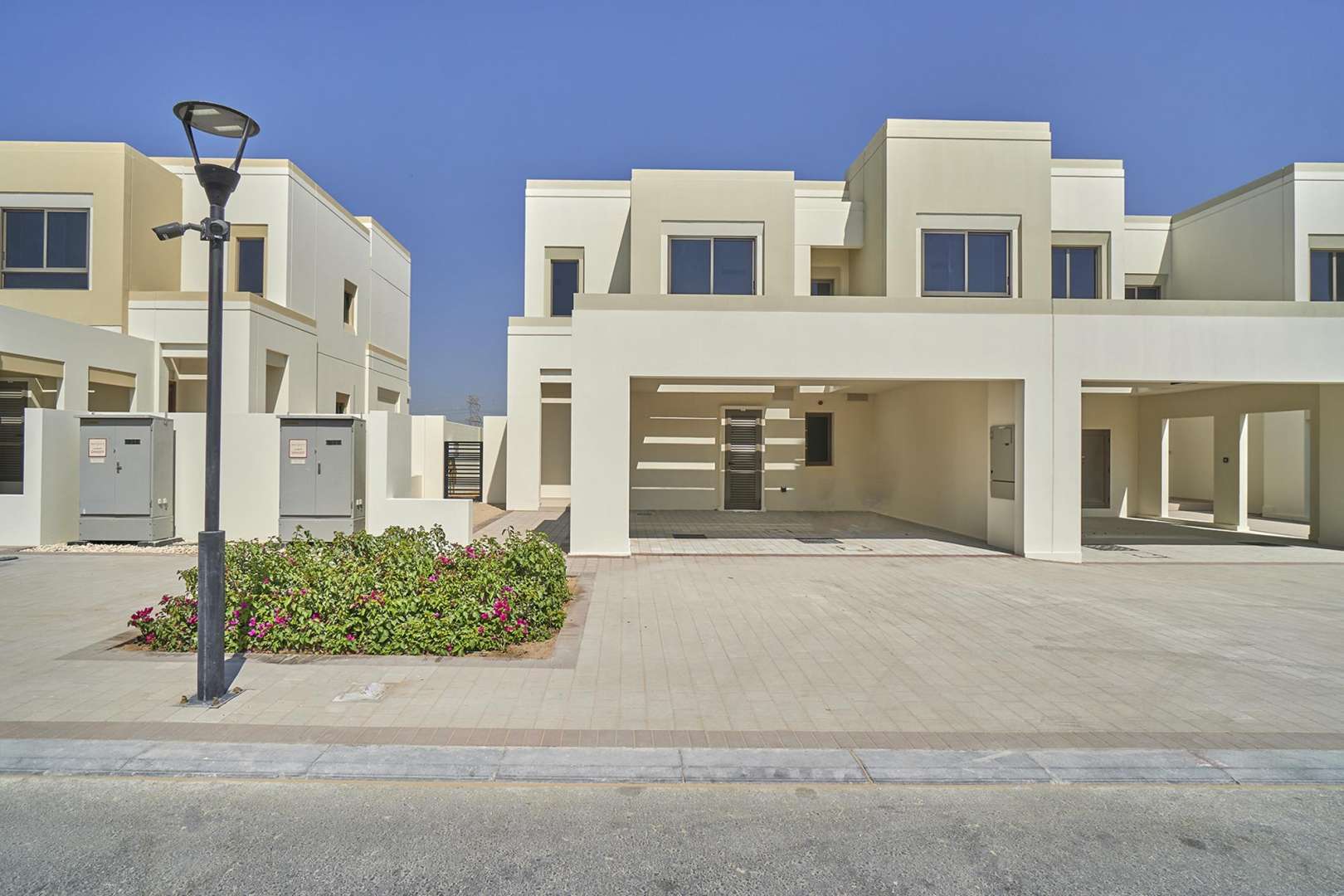 Empty bedroom with built-in wardrobe in Naseem Townhouses, Town Square rental property