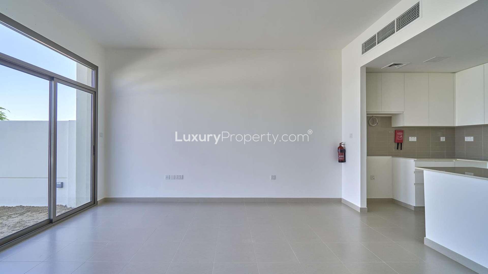 Empty bedroom in 4-bedroom townhouse for rent, Naseem, Town Square, with built-in wardrobe